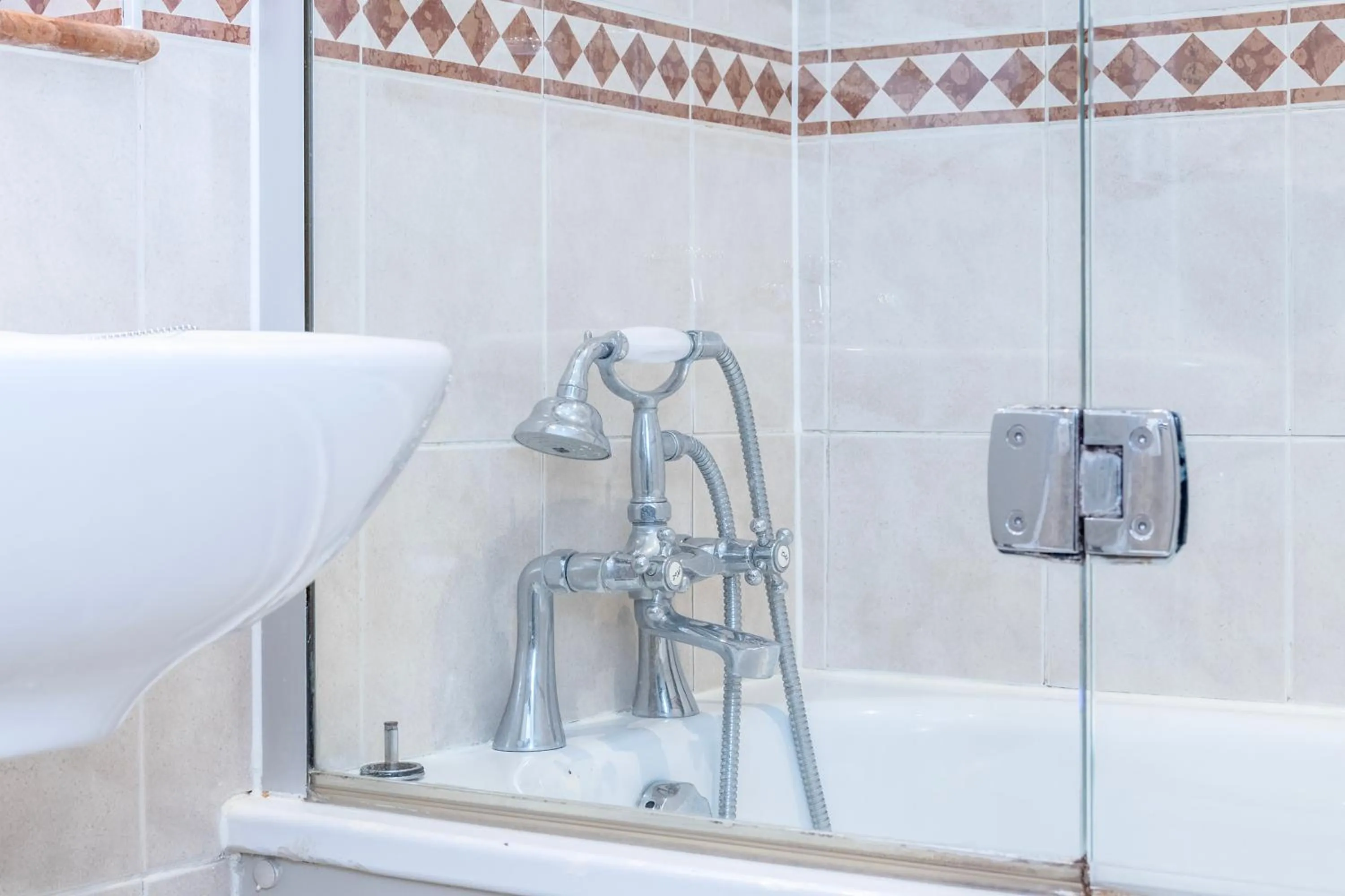 Bathroom in Winchester Wessex Hotel by Sunday