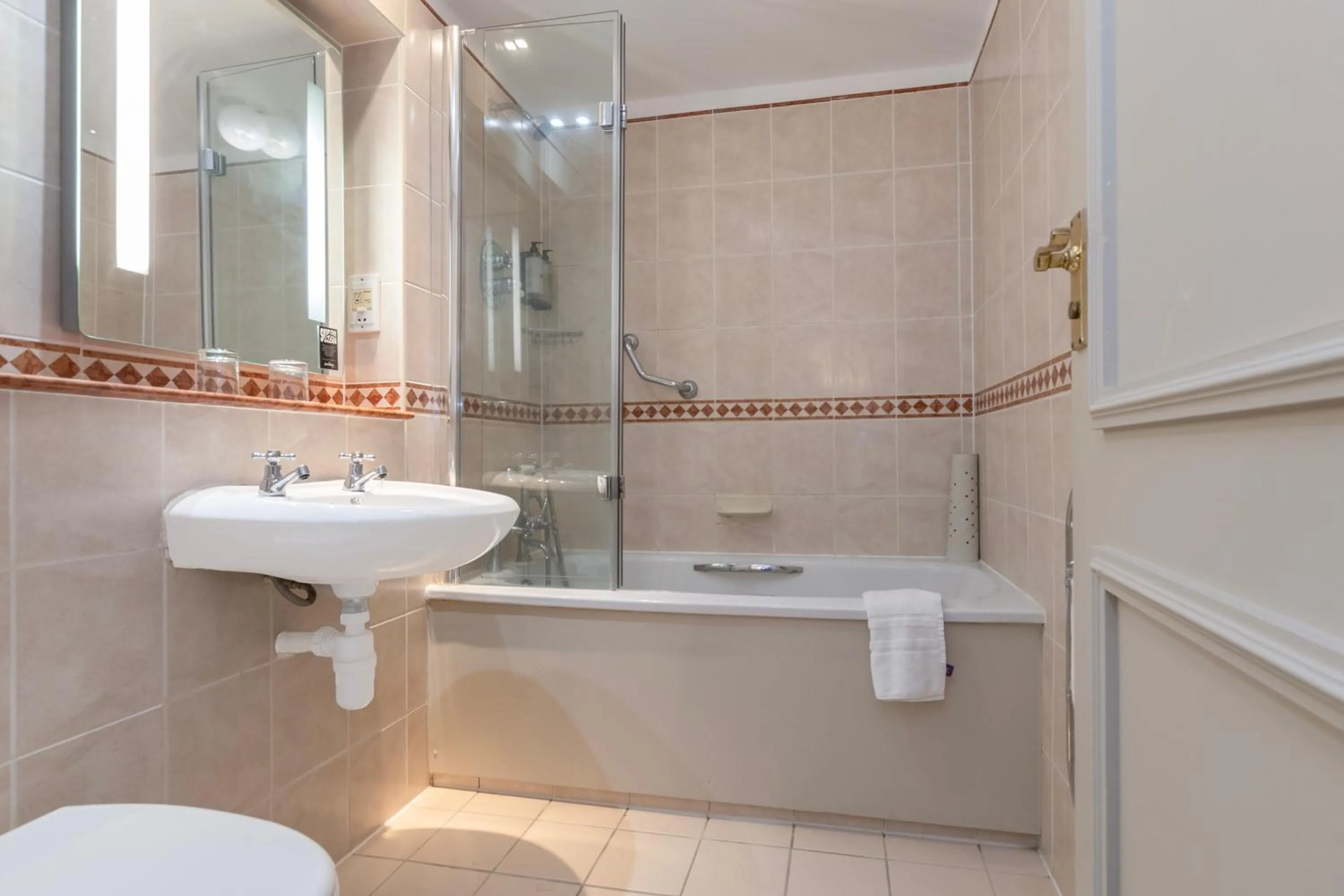 Bathroom in Winchester Wessex Hotel by Sunday