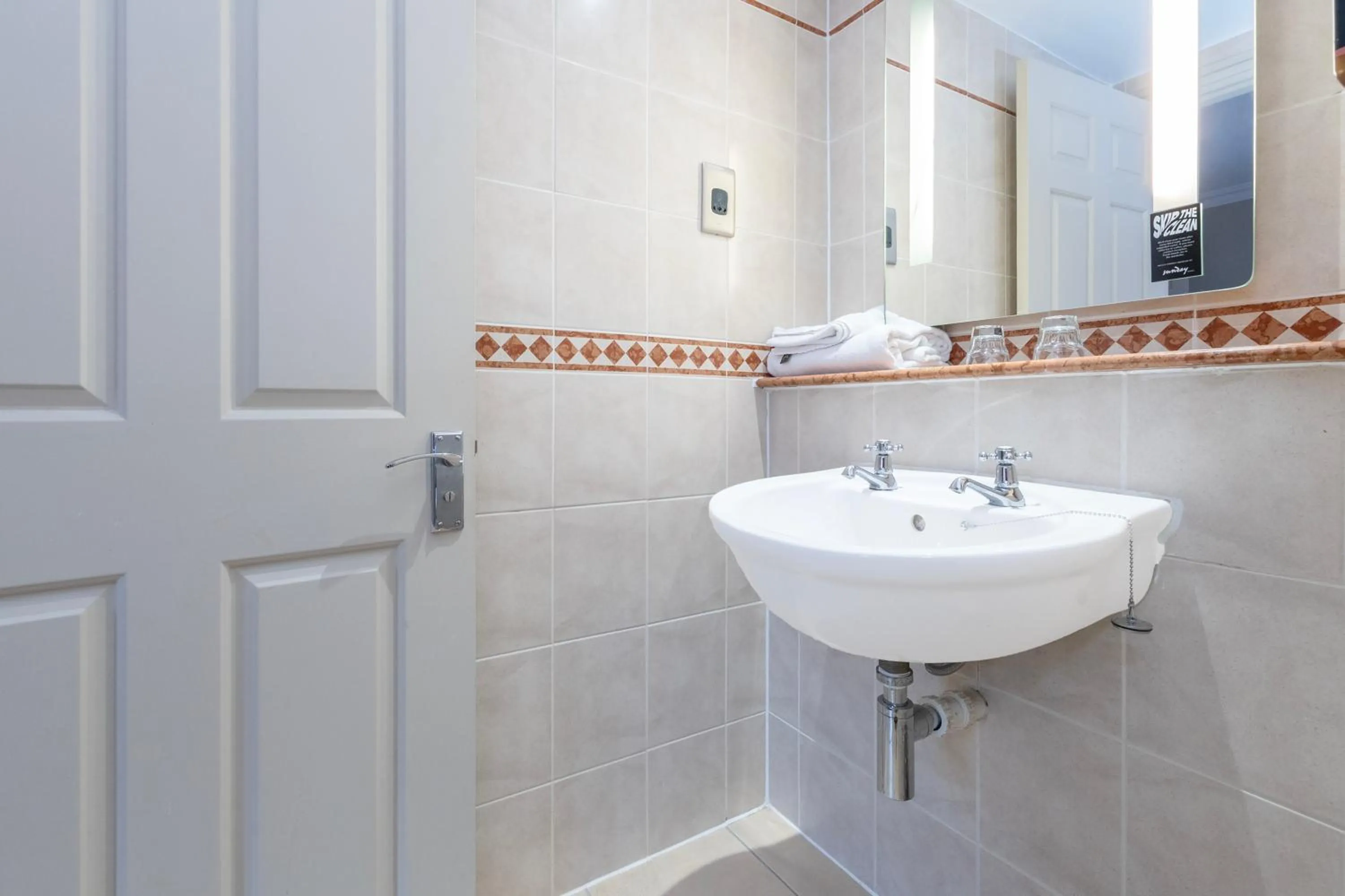 Bathroom in Winchester Wessex Hotel by Sunday