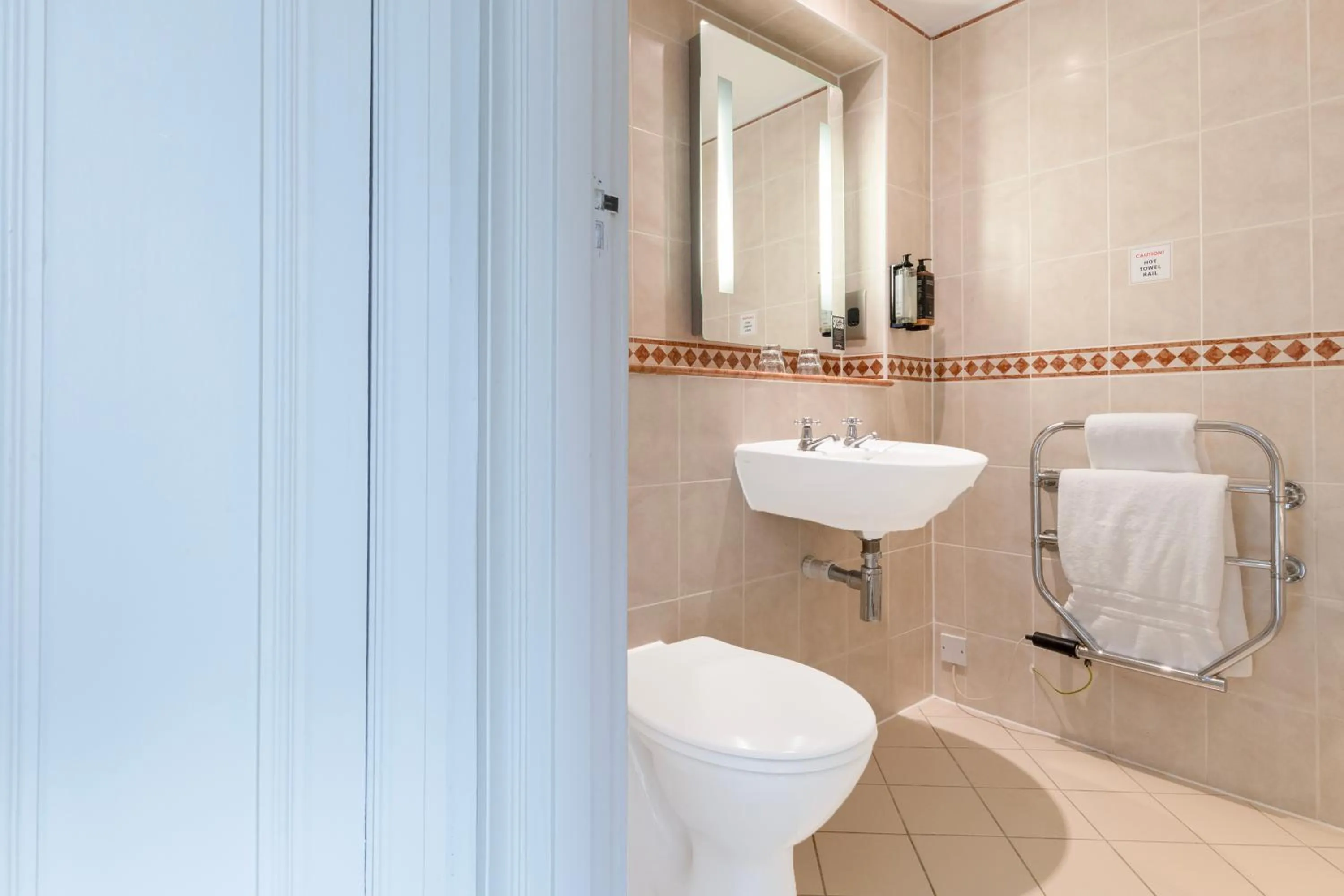 Bathroom in Winchester Wessex Hotel by Sunday