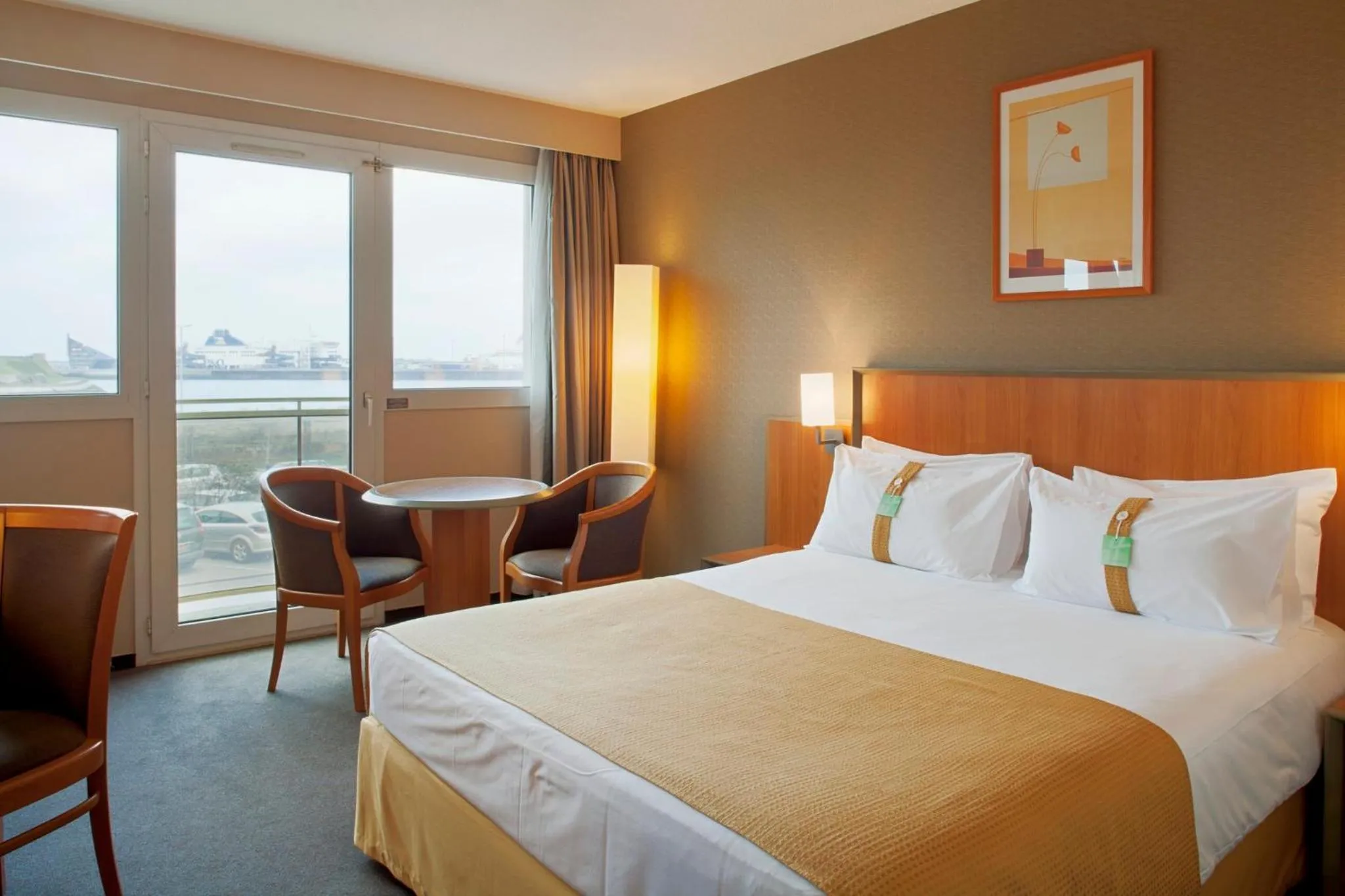 Photo of the whole room, Bed in Holiday Inn Calais-Centre by IHG