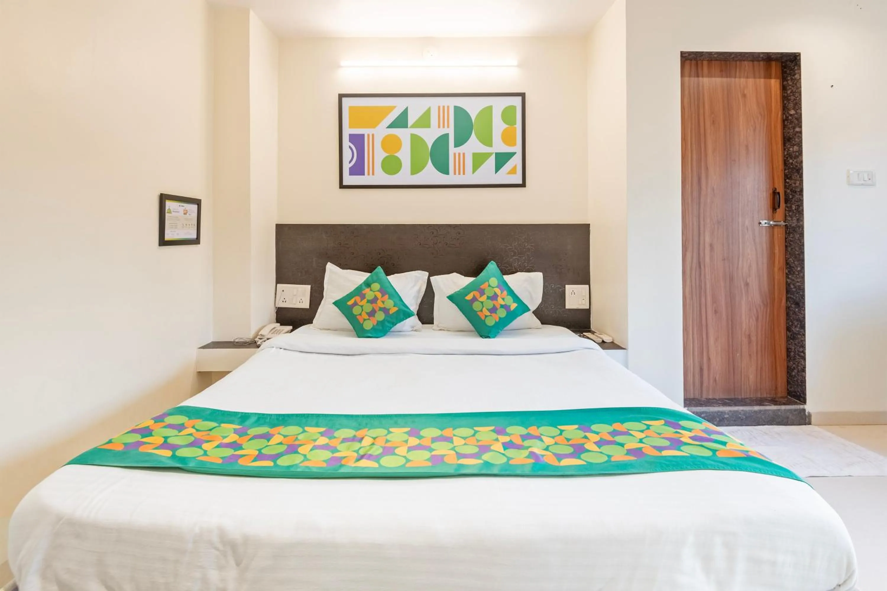 Bedroom, Bed in Treebo Kuber Palace with Swimming Pool