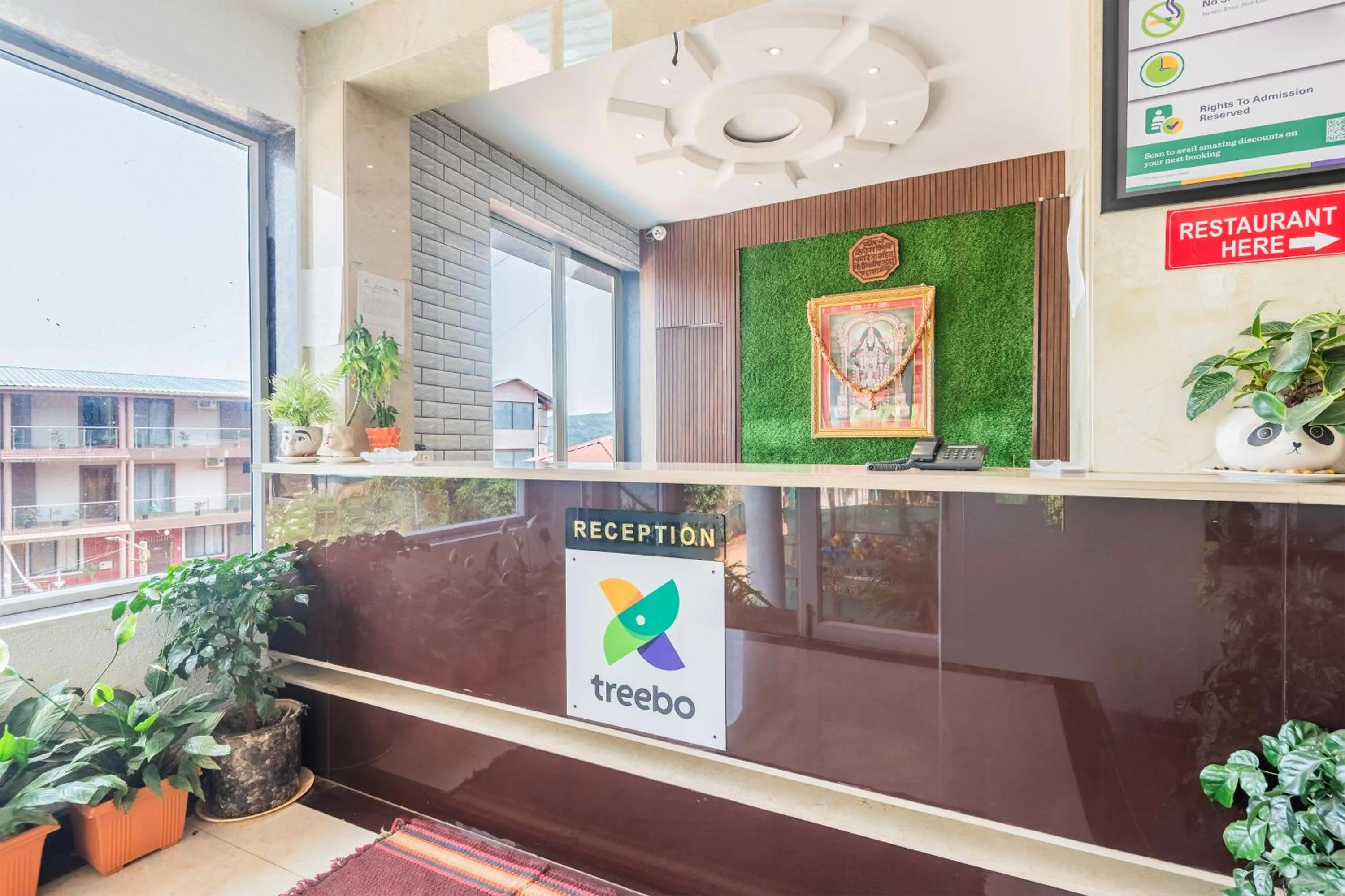 Lobby or reception in Treebo Kuber Palace with Swimming Pool