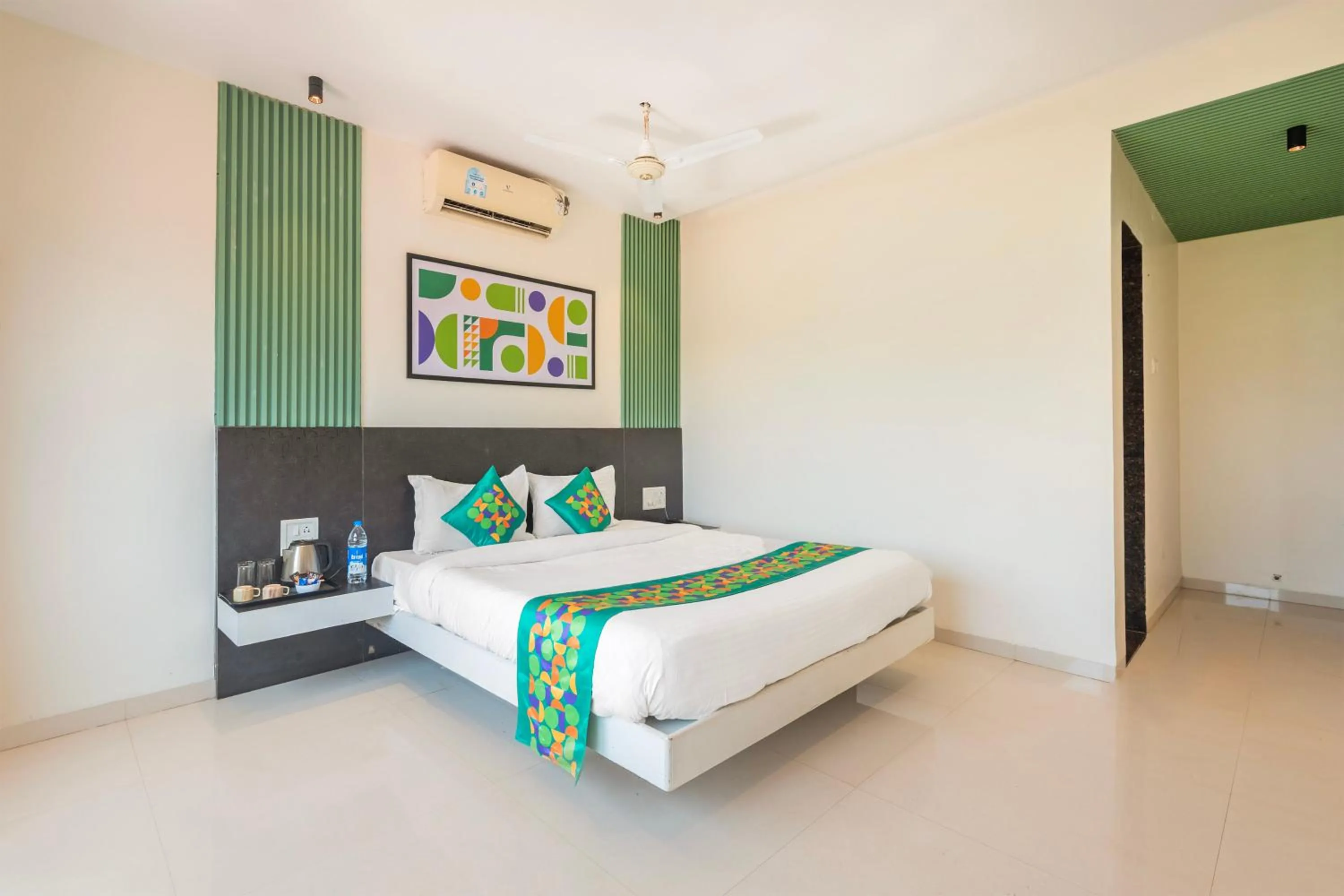 Bedroom, Bed in Treebo Kuber Palace with Swimming Pool