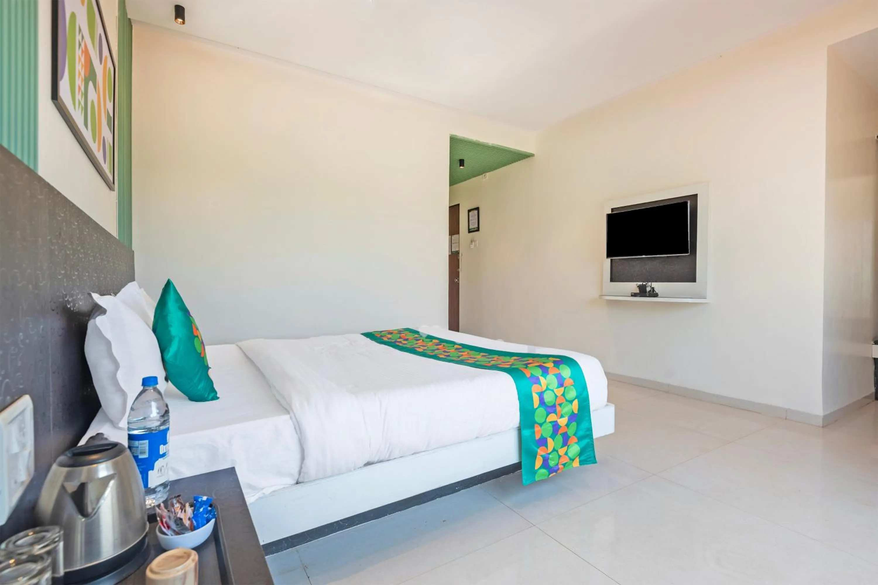Bedroom, Bed in Treebo Kuber Palace with Swimming Pool