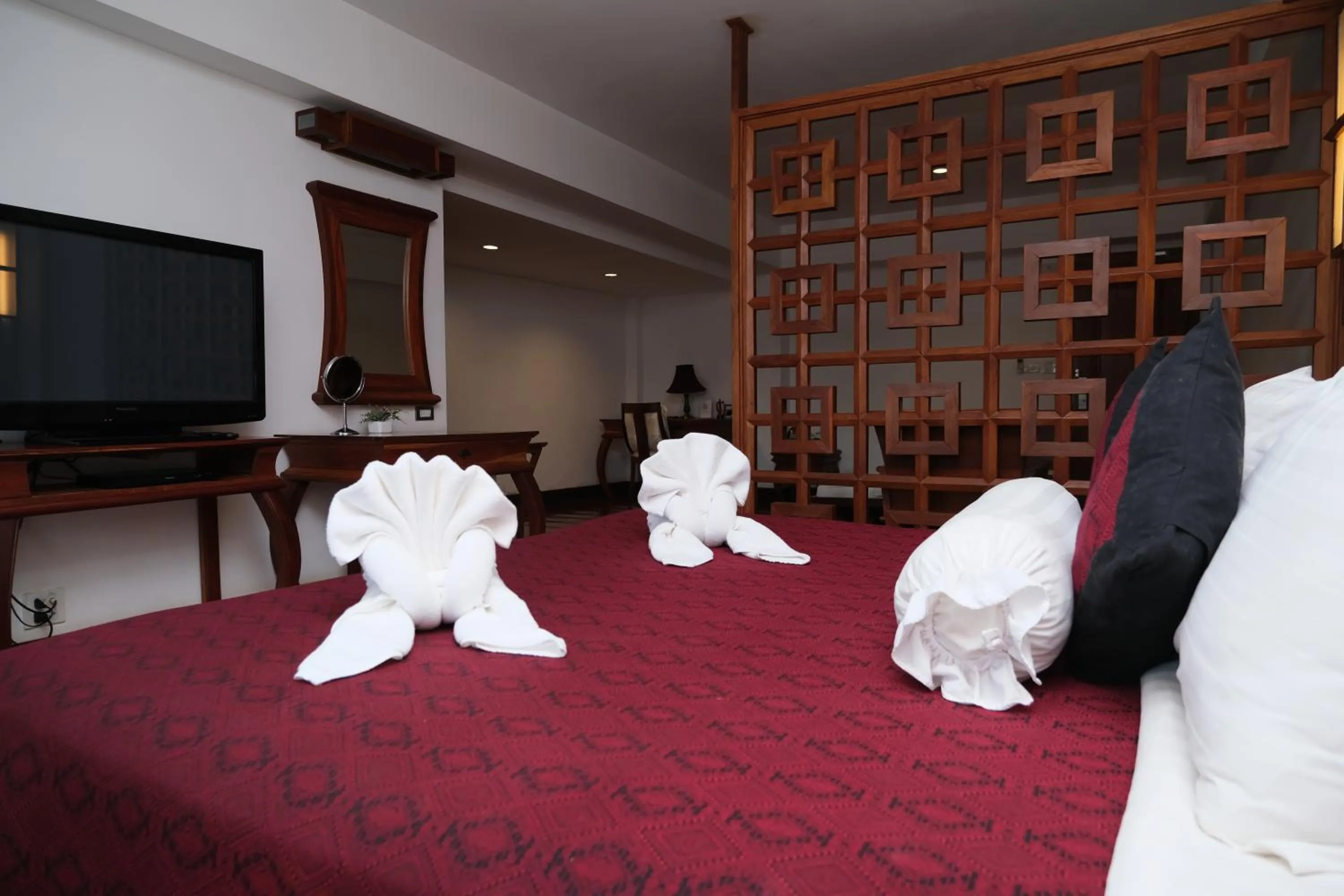 Bed in Chanthapanya Hotel