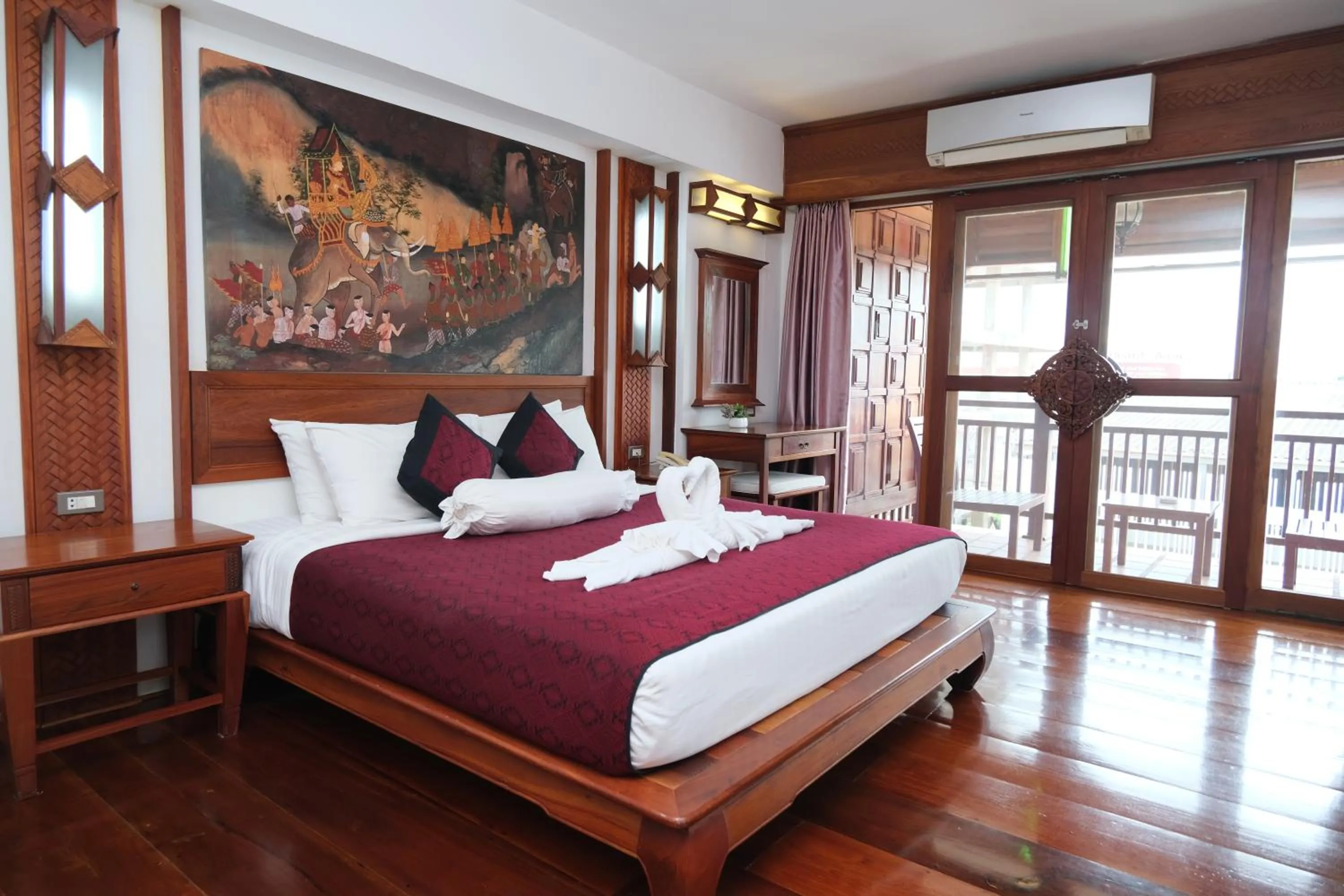 Bed in Chanthapanya Hotel
