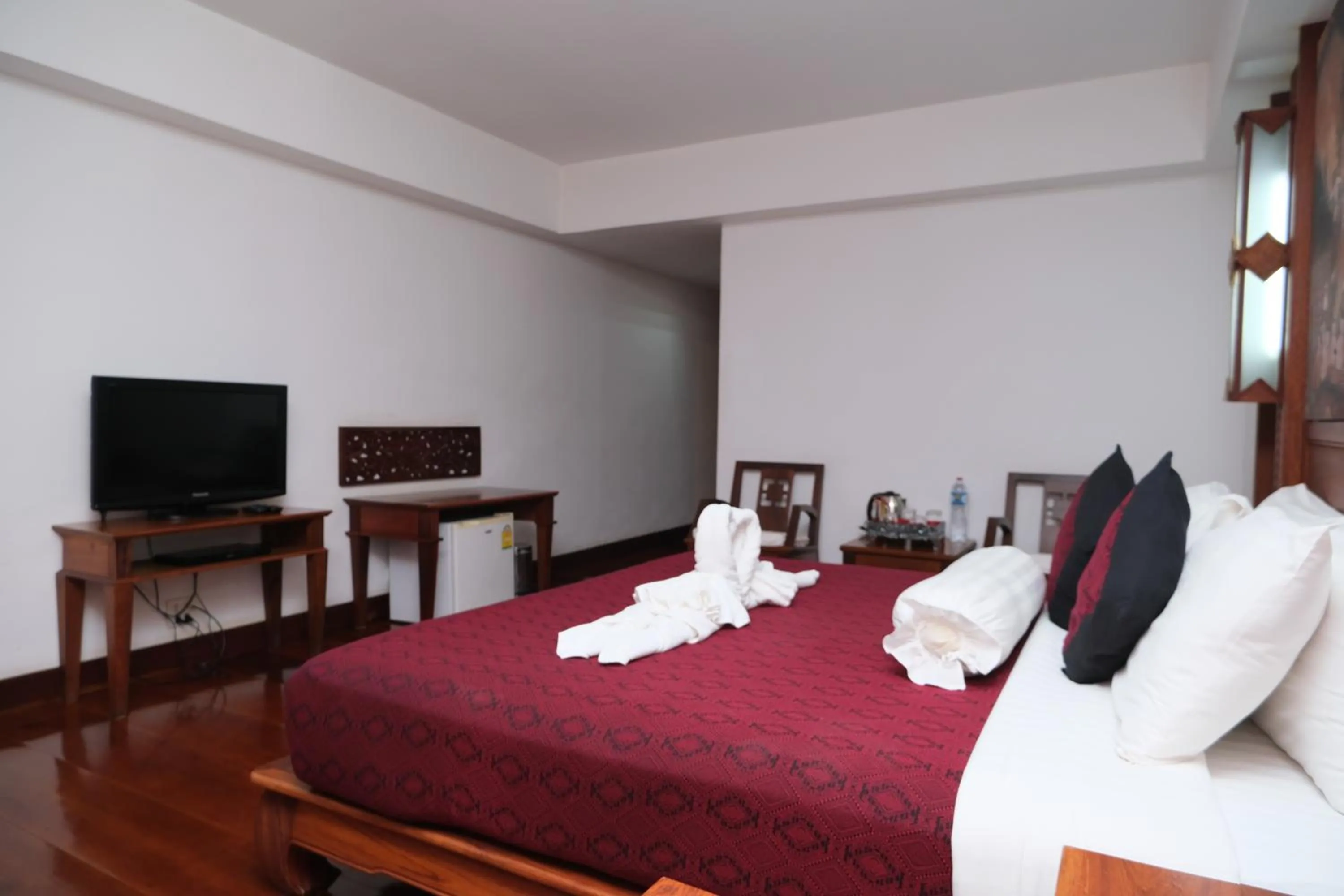 Bed in Chanthapanya Hotel