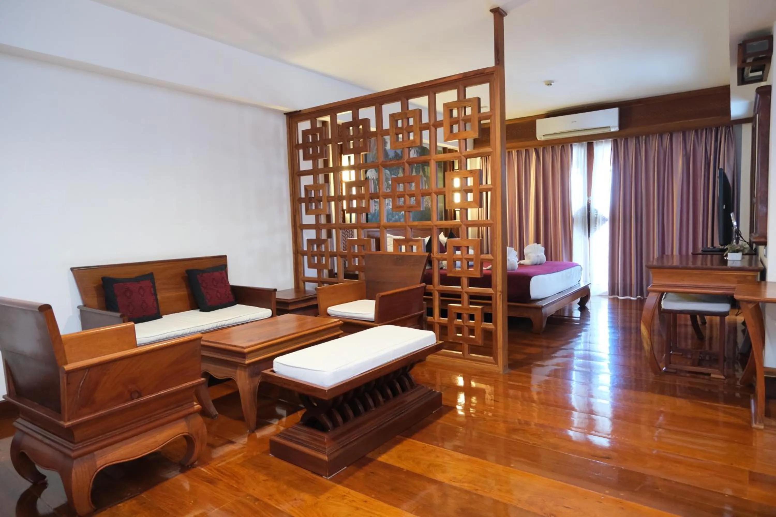 Bed in Chanthapanya Hotel