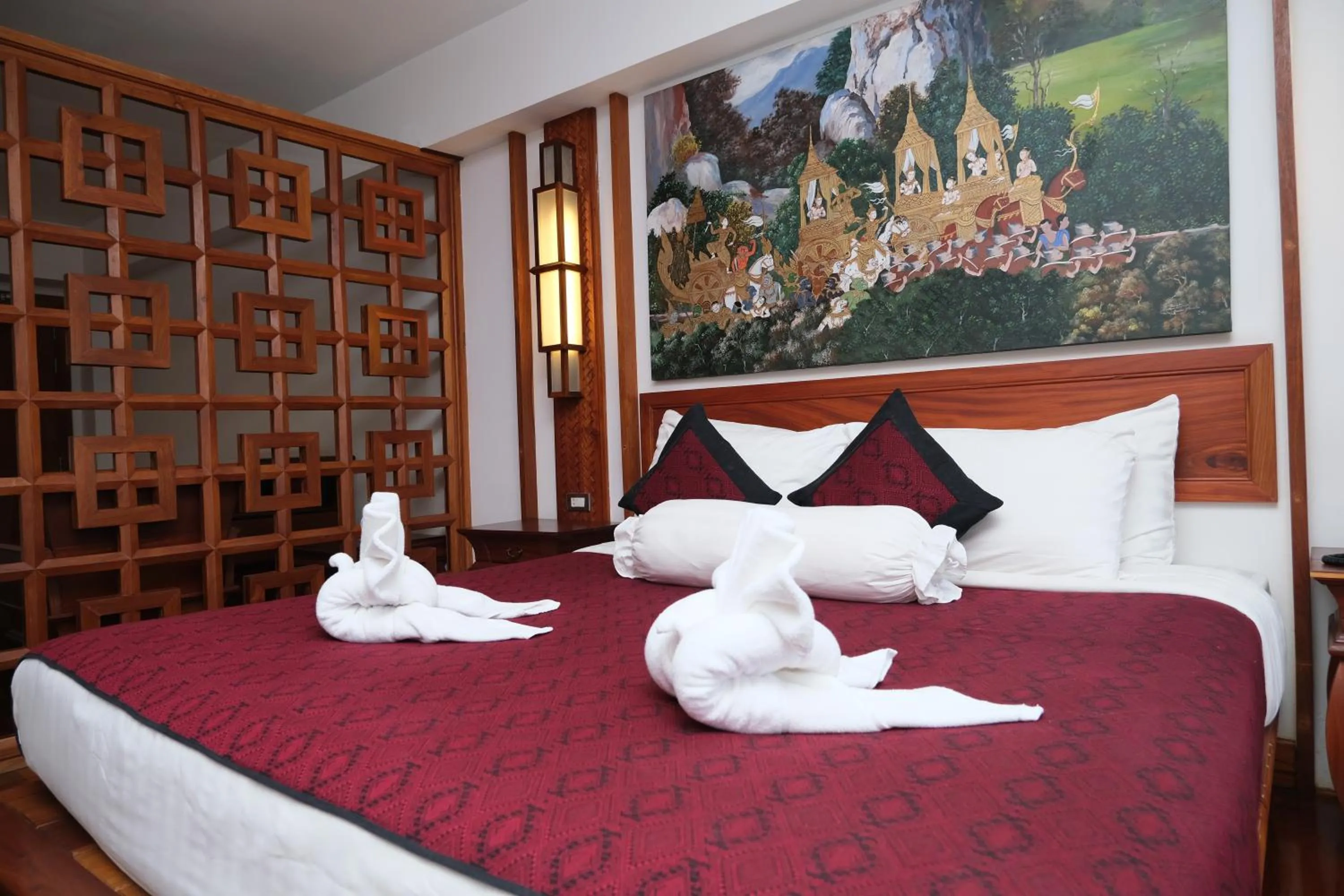 Bed in Chanthapanya Hotel