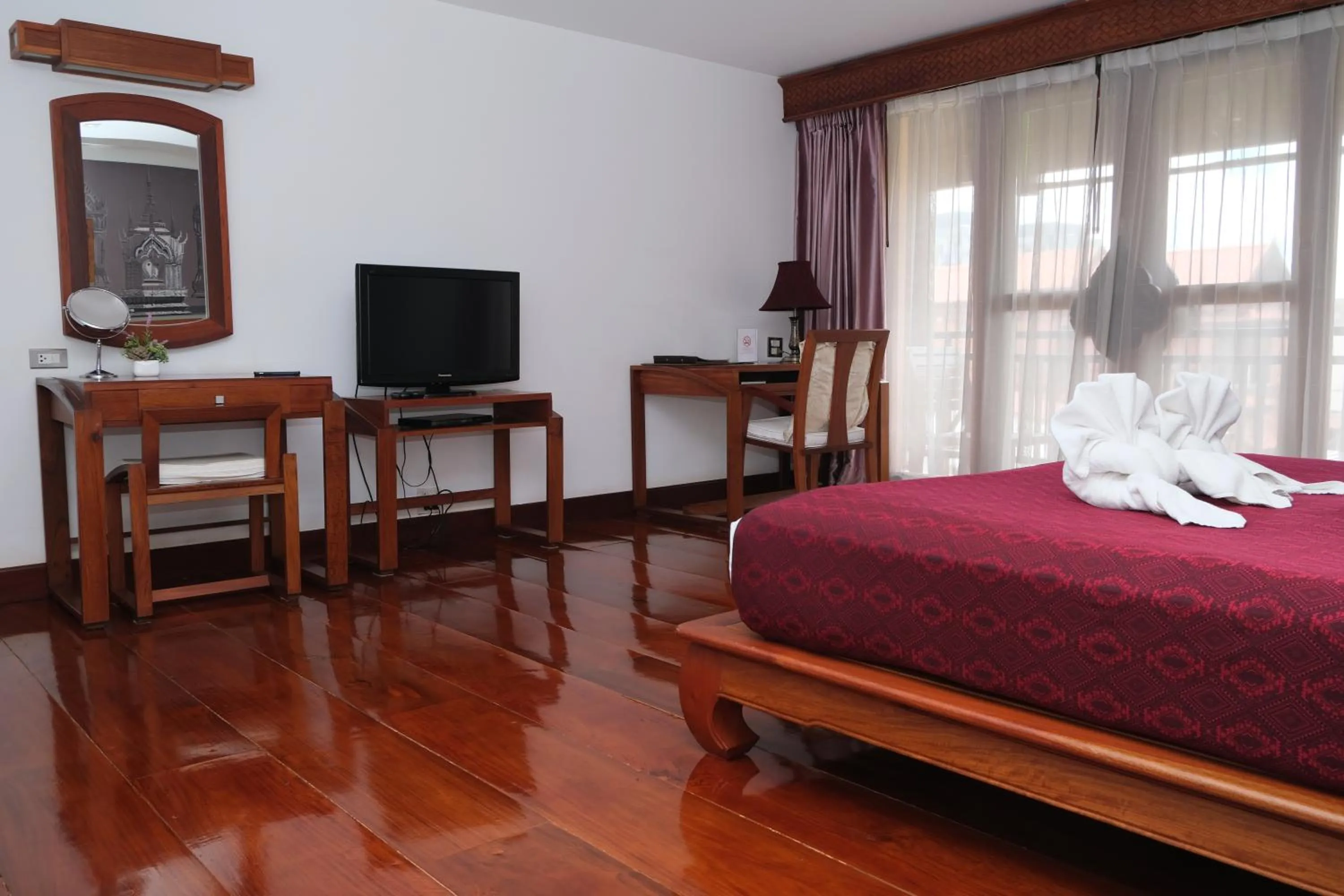 Bed in Chanthapanya Hotel