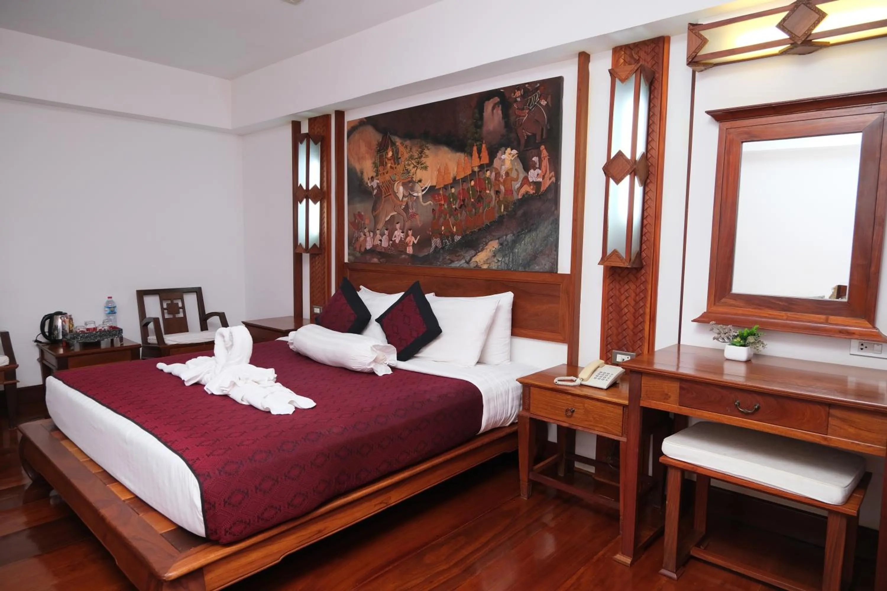 Bed in Chanthapanya Hotel