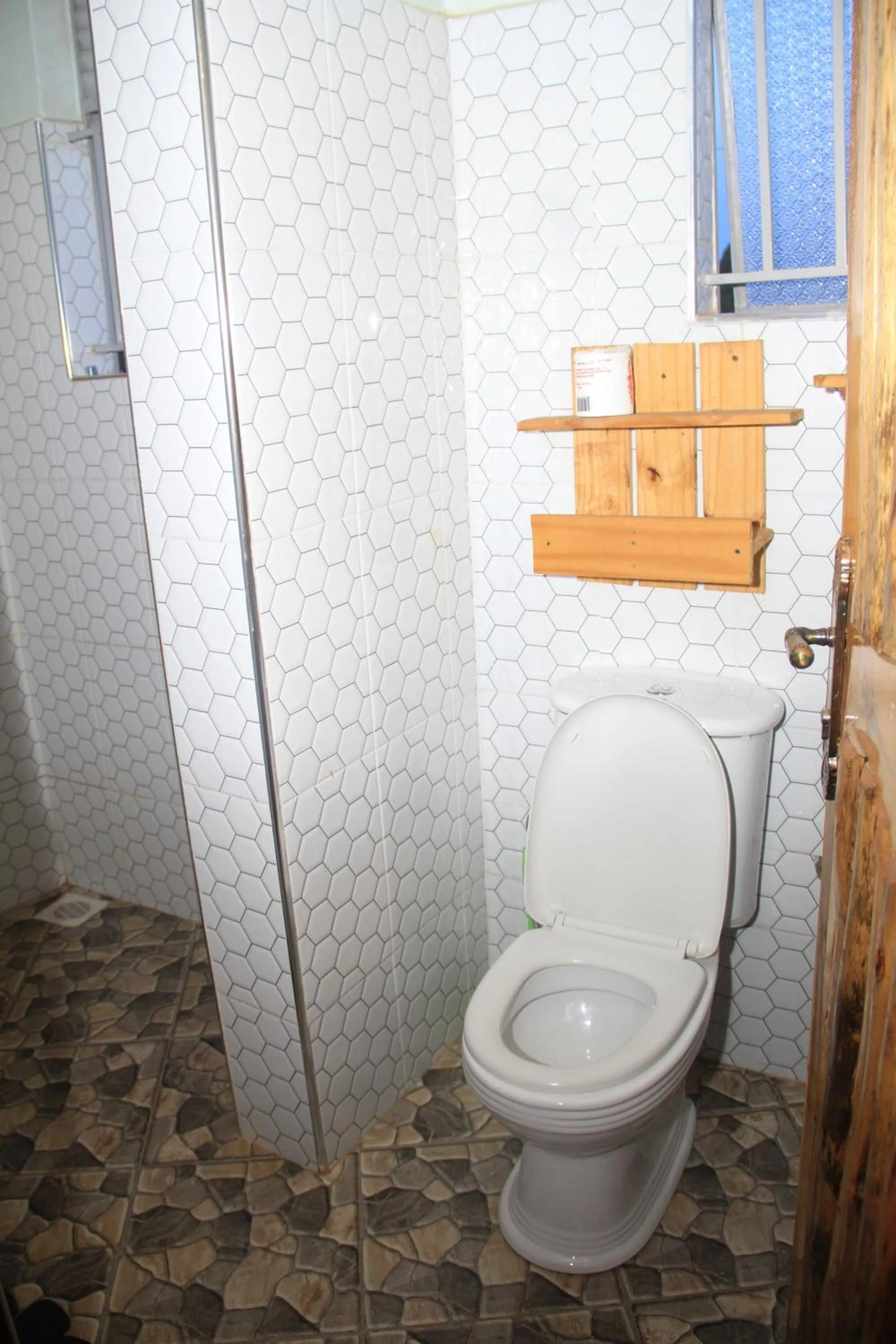 Toilet in Elite Backpackers Services