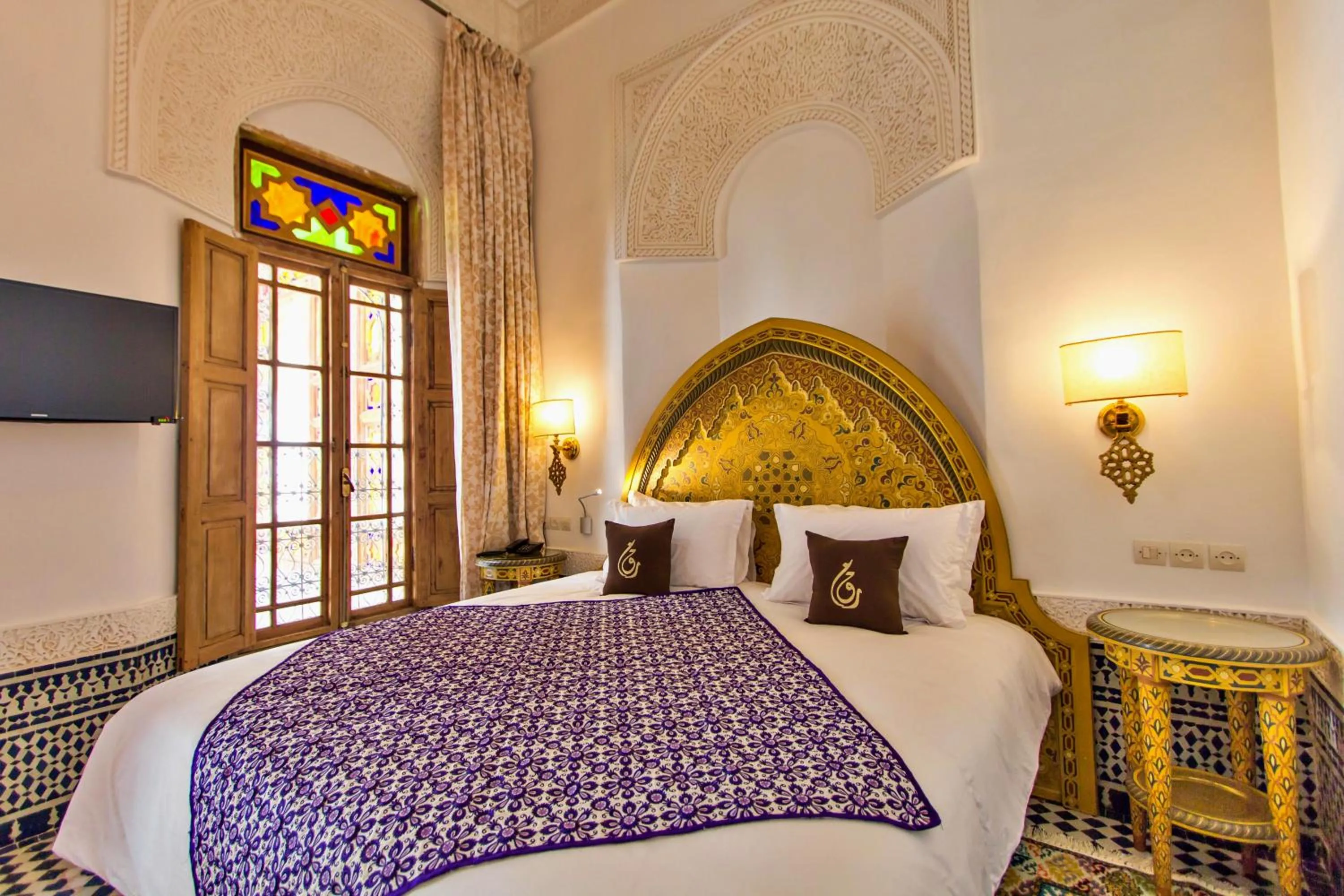 Bed in Riad Marjana suites & Spa