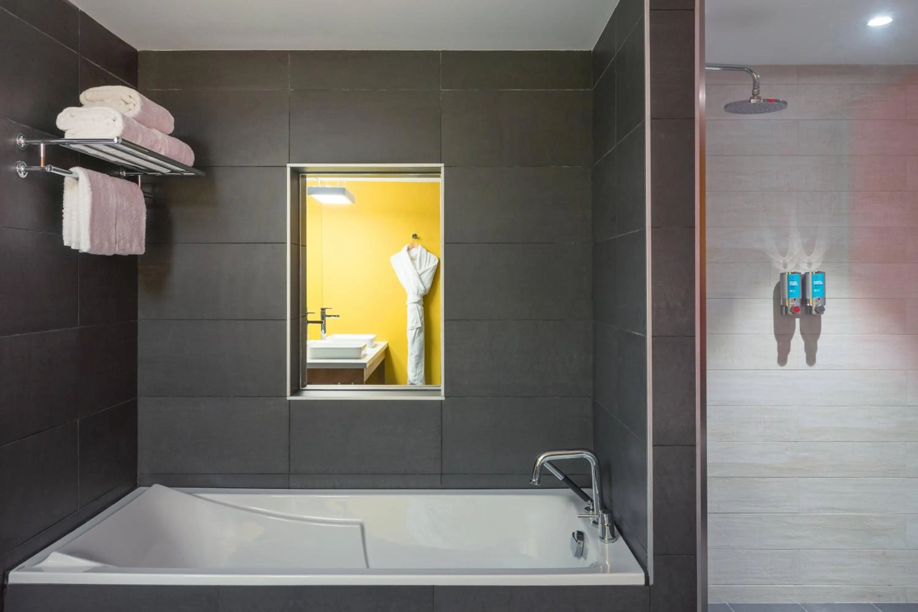 Bathroom in Aloft Al Ain