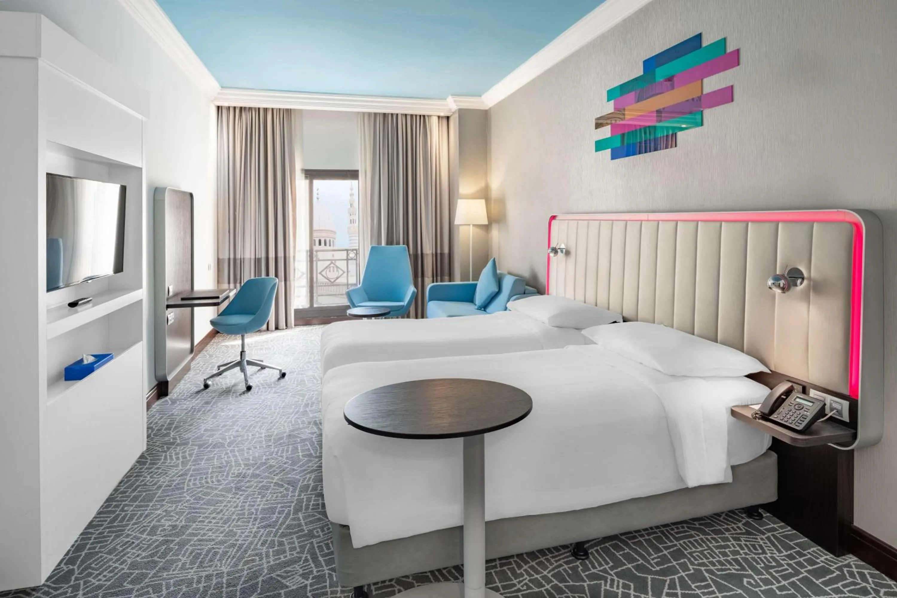 Photo of the whole room, Bed in Park Inn by Radisson Makkah Al Naseem