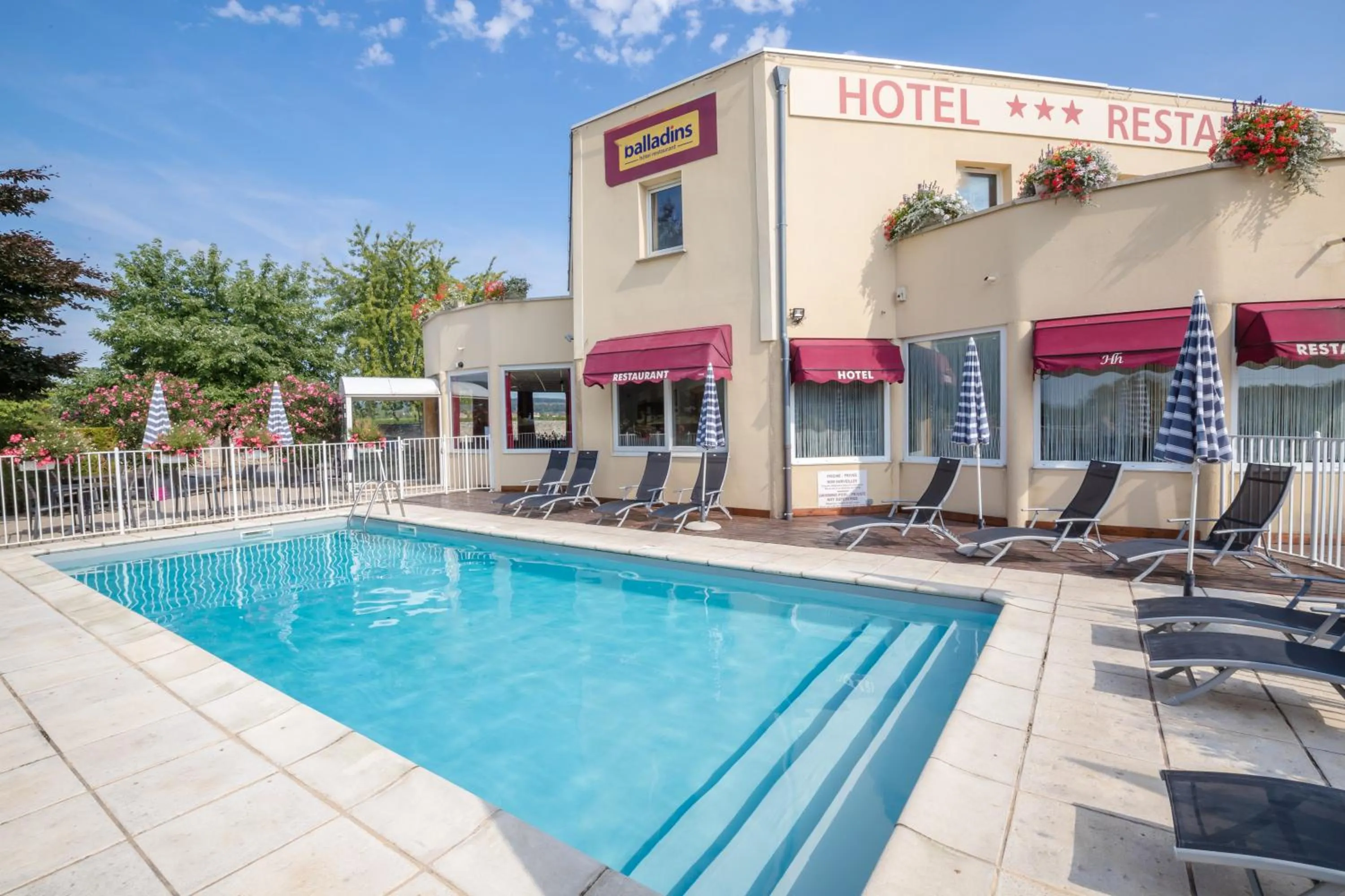 Swimming pool in Authentic by balladins Dijon / Marsannay-la-Côte