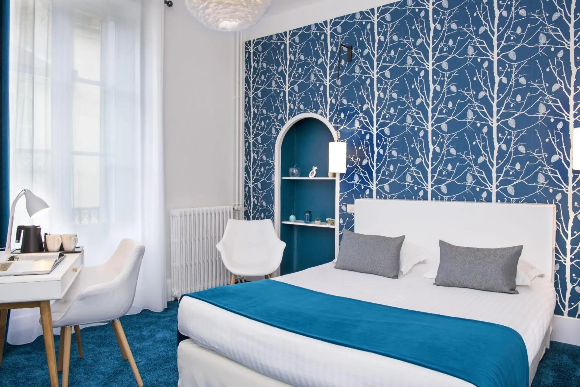 Decorative detail, Bed in Hôtel Les Nations The Originals Boutique VICHY Decorative detail, Bed in Hôtel Les Nations The Originals Boutique VICHY