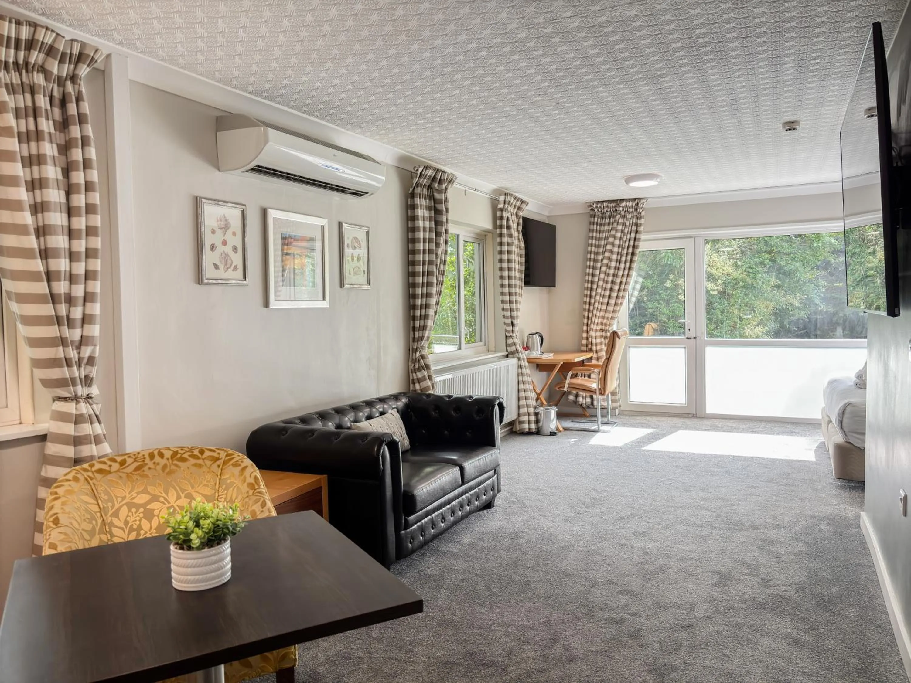 Living room in Ivy Bush Royal Hotel by Compass Hospitality