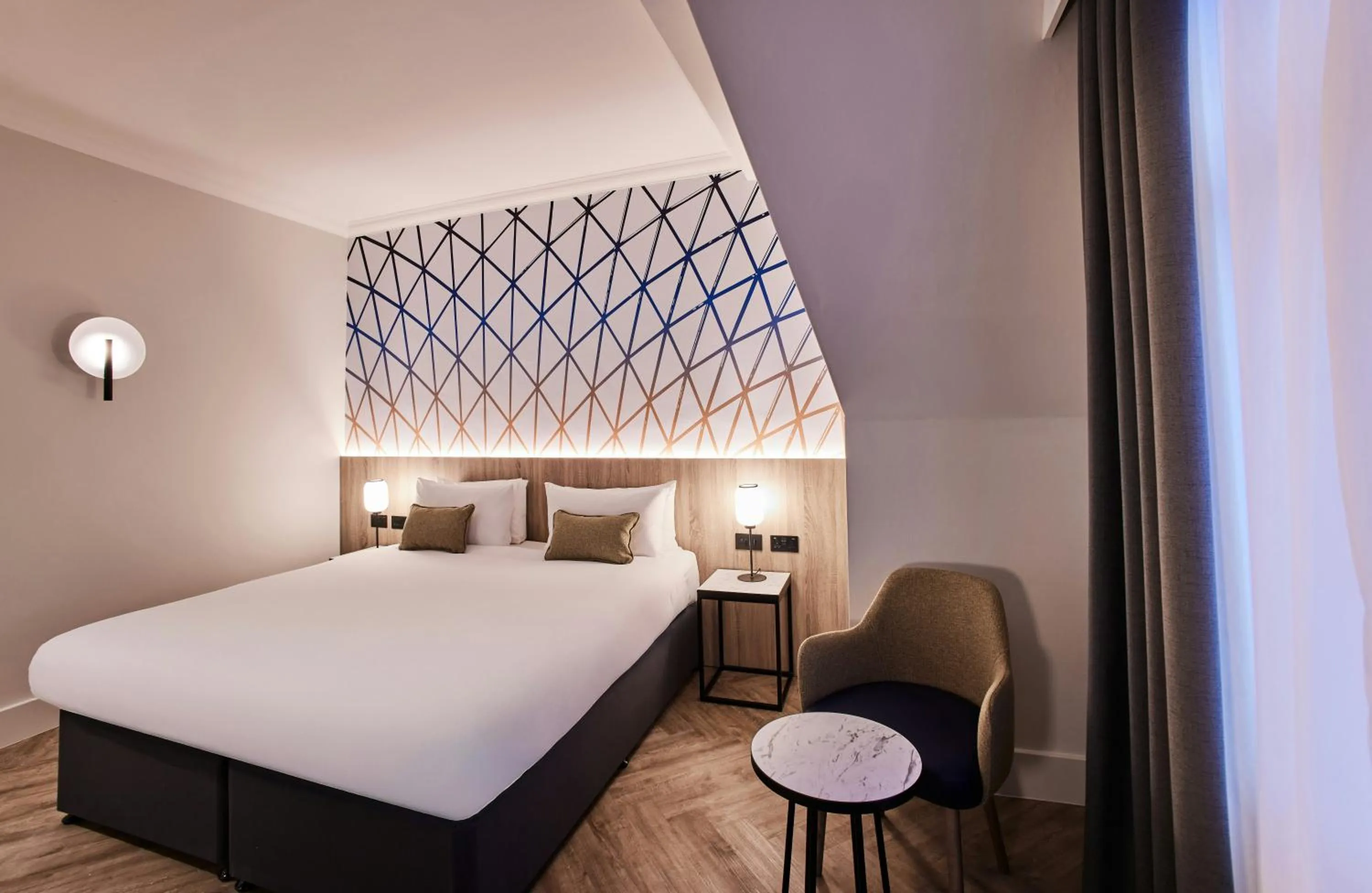 Bed in Thistle London Bloomsbury Park