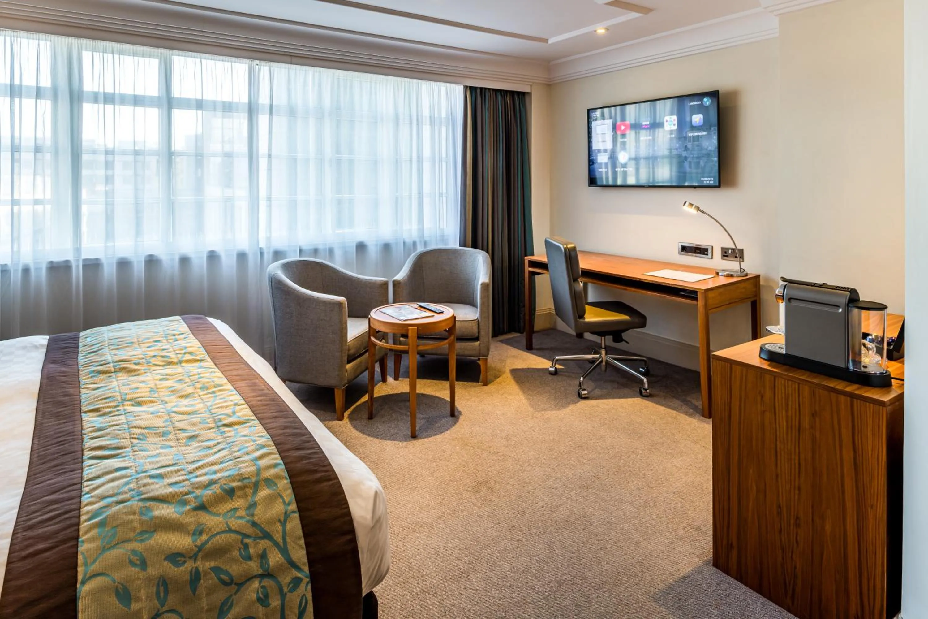 Seating area, Bed in The Marble Arch Hotel, by Thistle