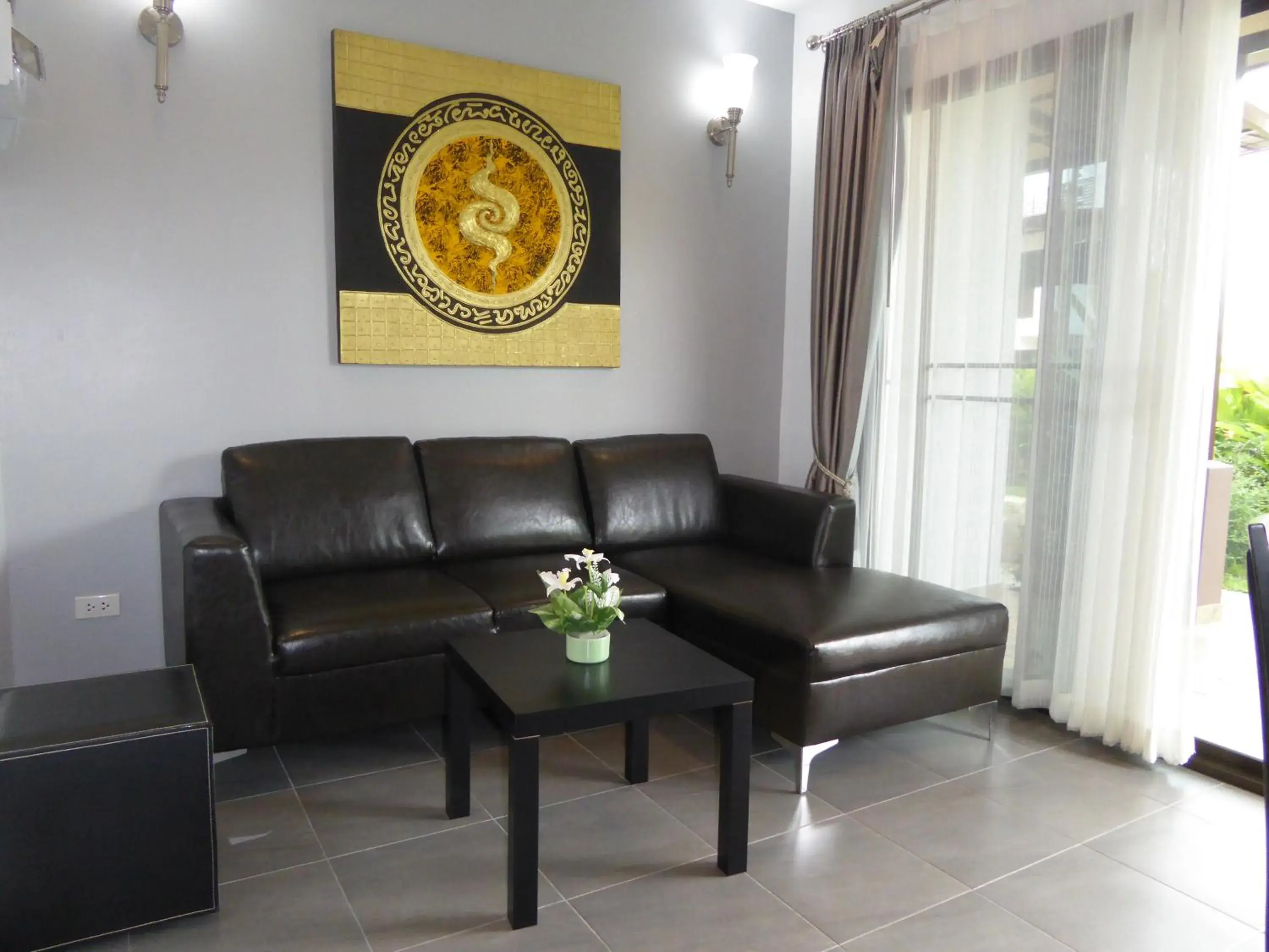 Living room in Oasis Garden & Pool Villa at VIP Resort Living room in Oasis Garden & Pool Villa at VIP Resort