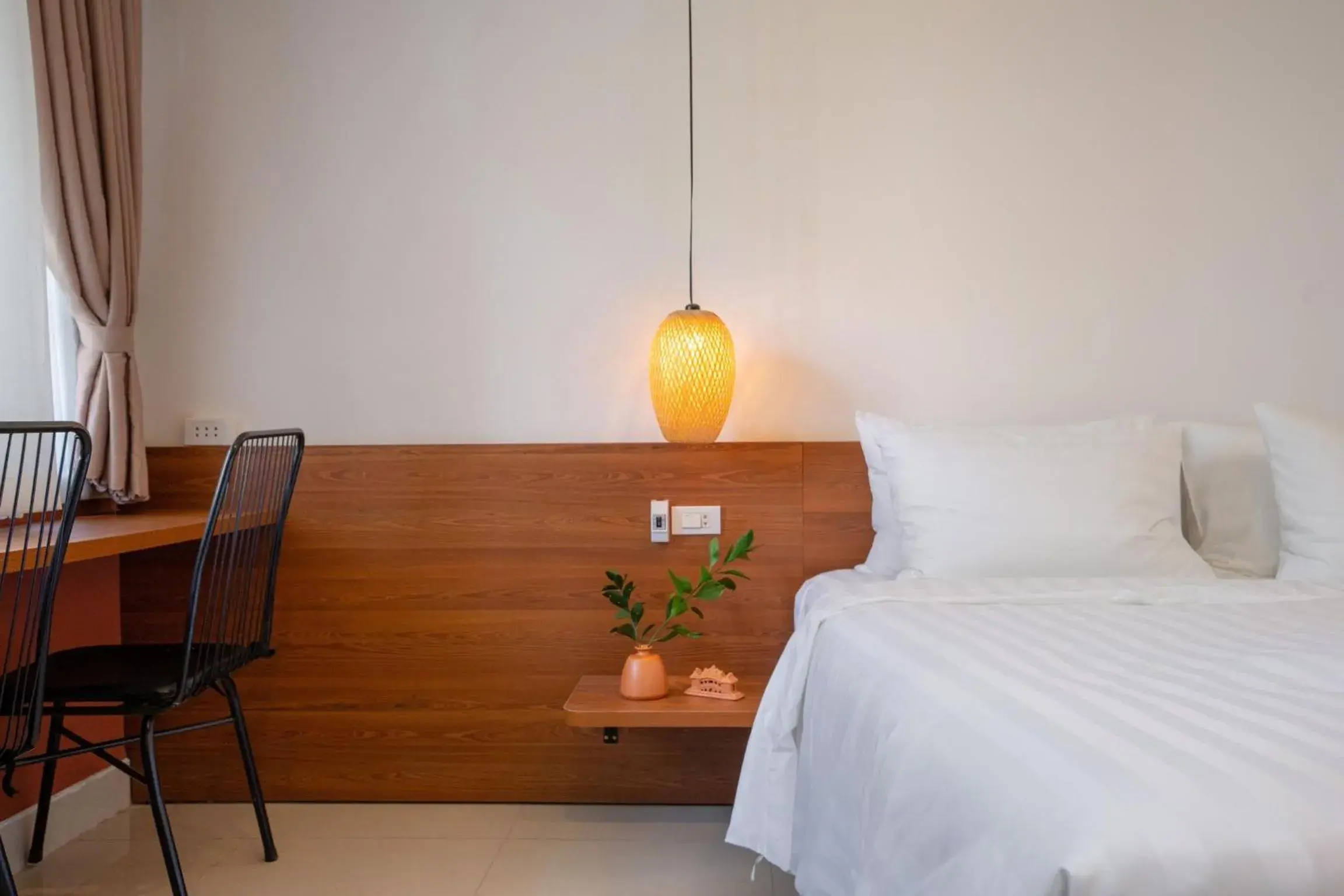 Bed in First Hoianese Center Hotel - A Member Of Hoianese Cultural Experiential Hotel Bed in First Hoianese Center Hotel - A Member Of Hoianese Cultural Experiential Hotel