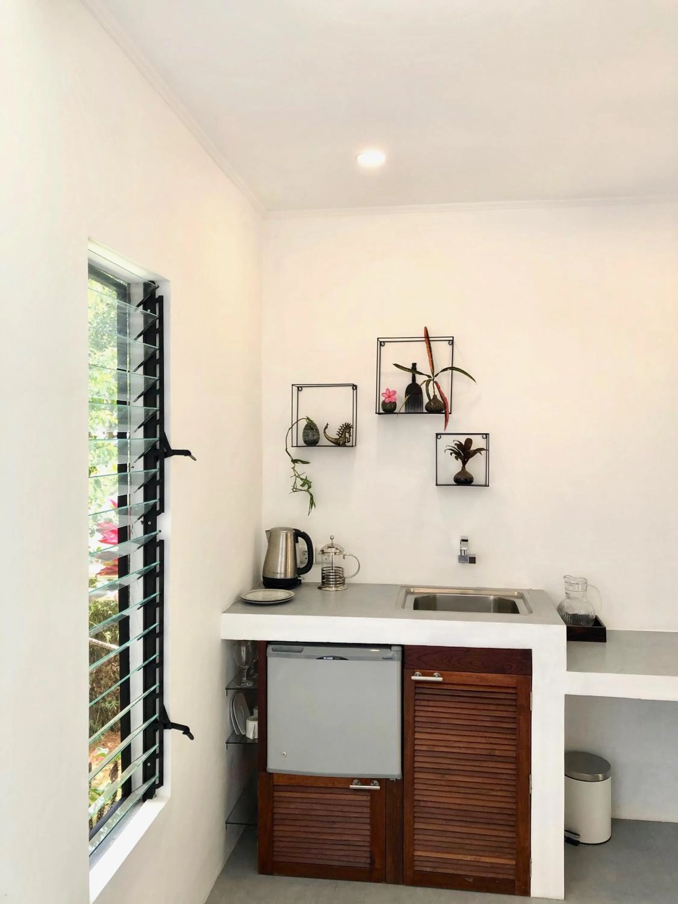 Kitchen or kitchenette in Puncak Air Manis Residence