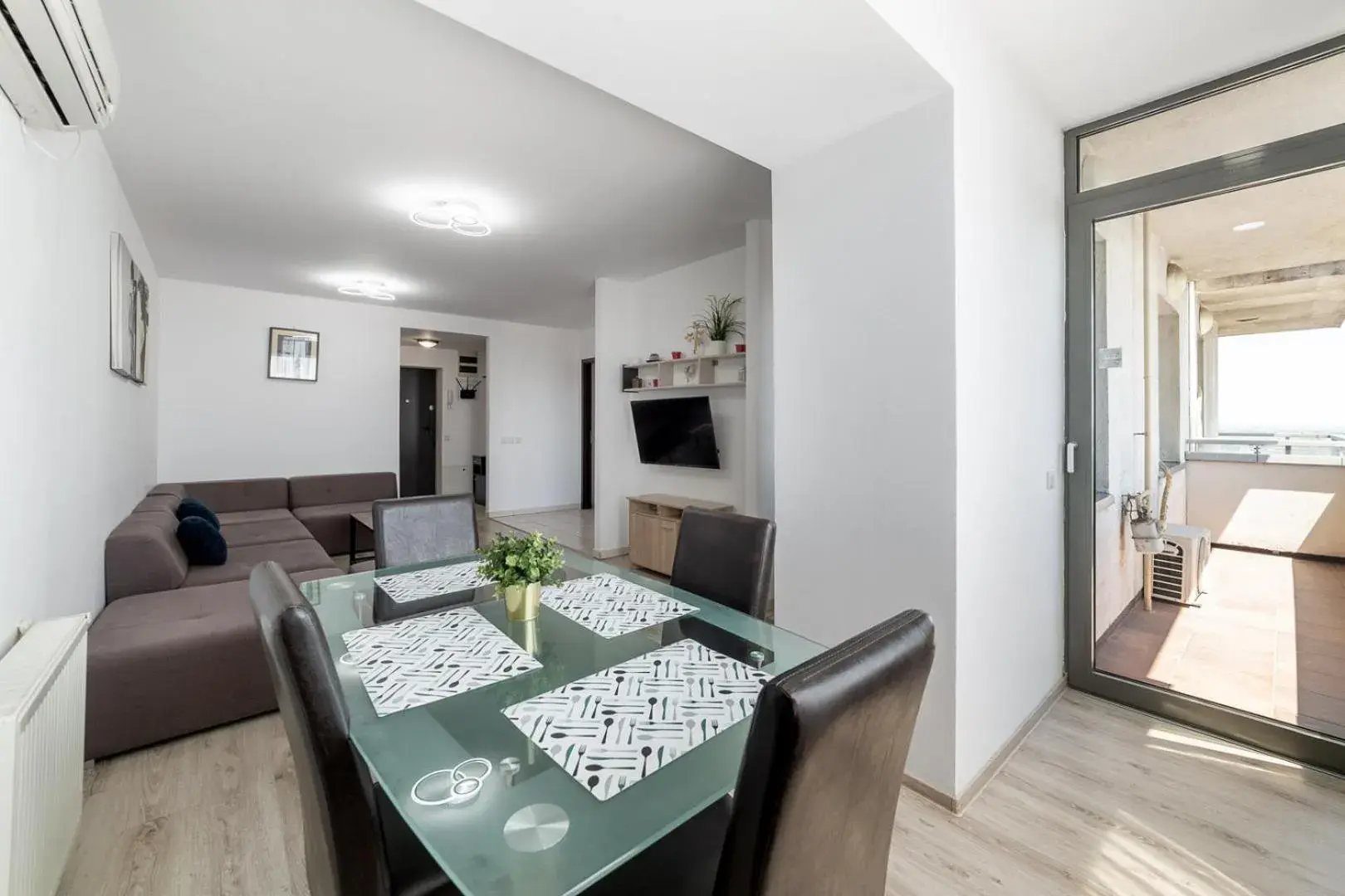 Living room in Monaco Grand Apartments By CityBookings Living room in Monaco Grand Apartments By CityBookings