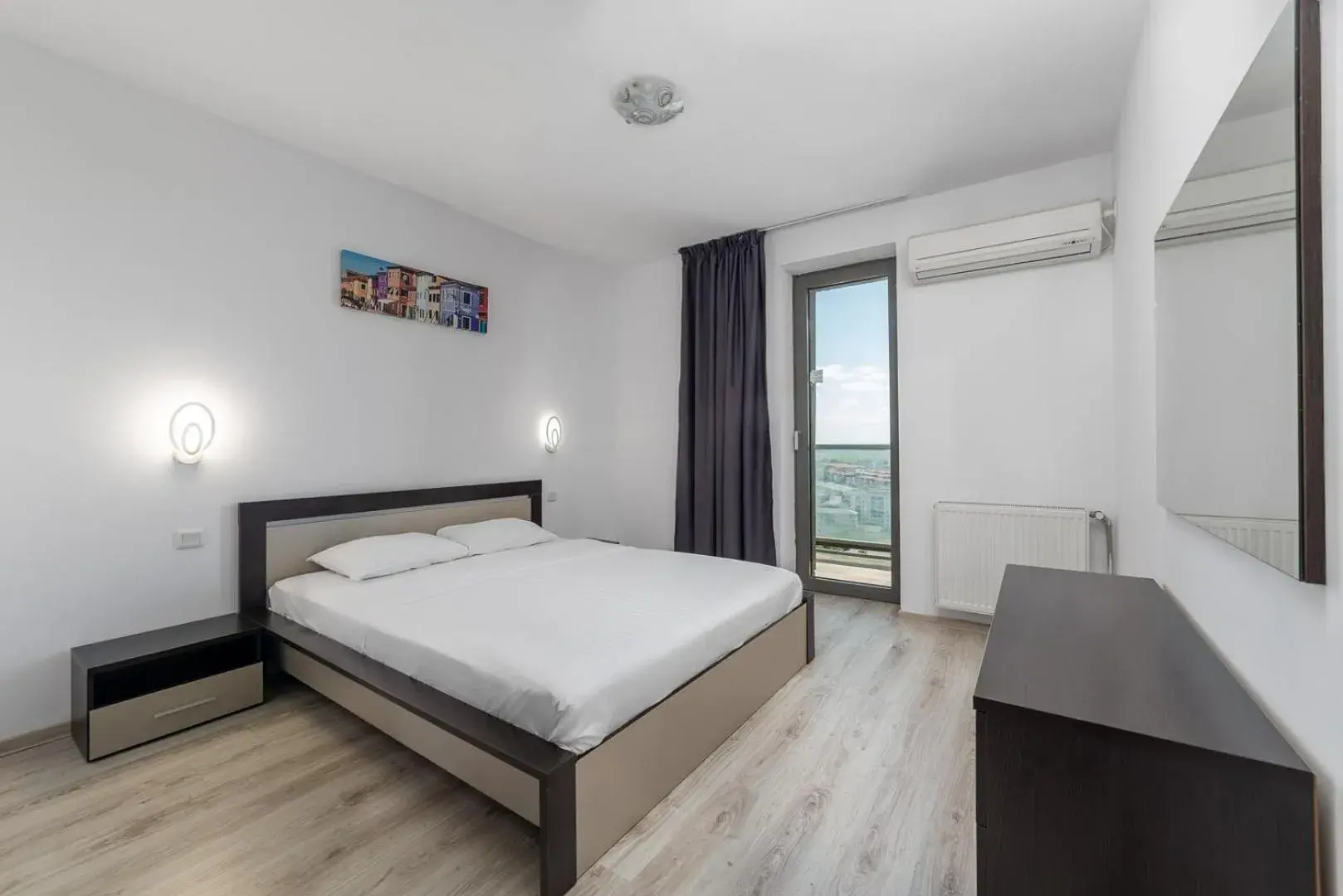 Two-Bedroom Apartment with Balcony in Monaco Grand Apartments By CityBookings Two-Bedroom Apartment with Balcony in Monaco Grand Apartments By CityBookings