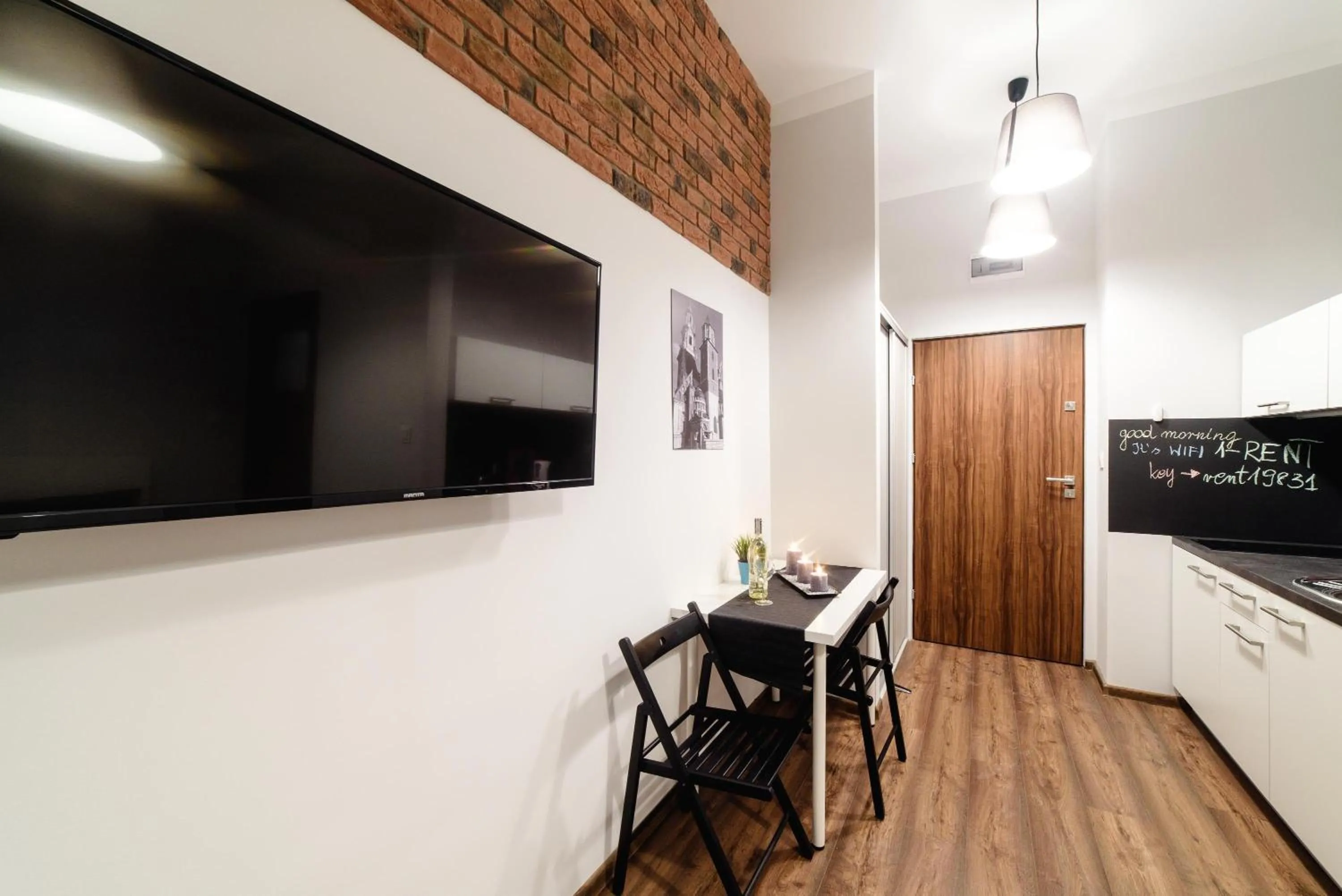 Dining area in 2 Nights Apartments - great location, right next to Main Rail and Bus Station, 10 min to Main Square by foot