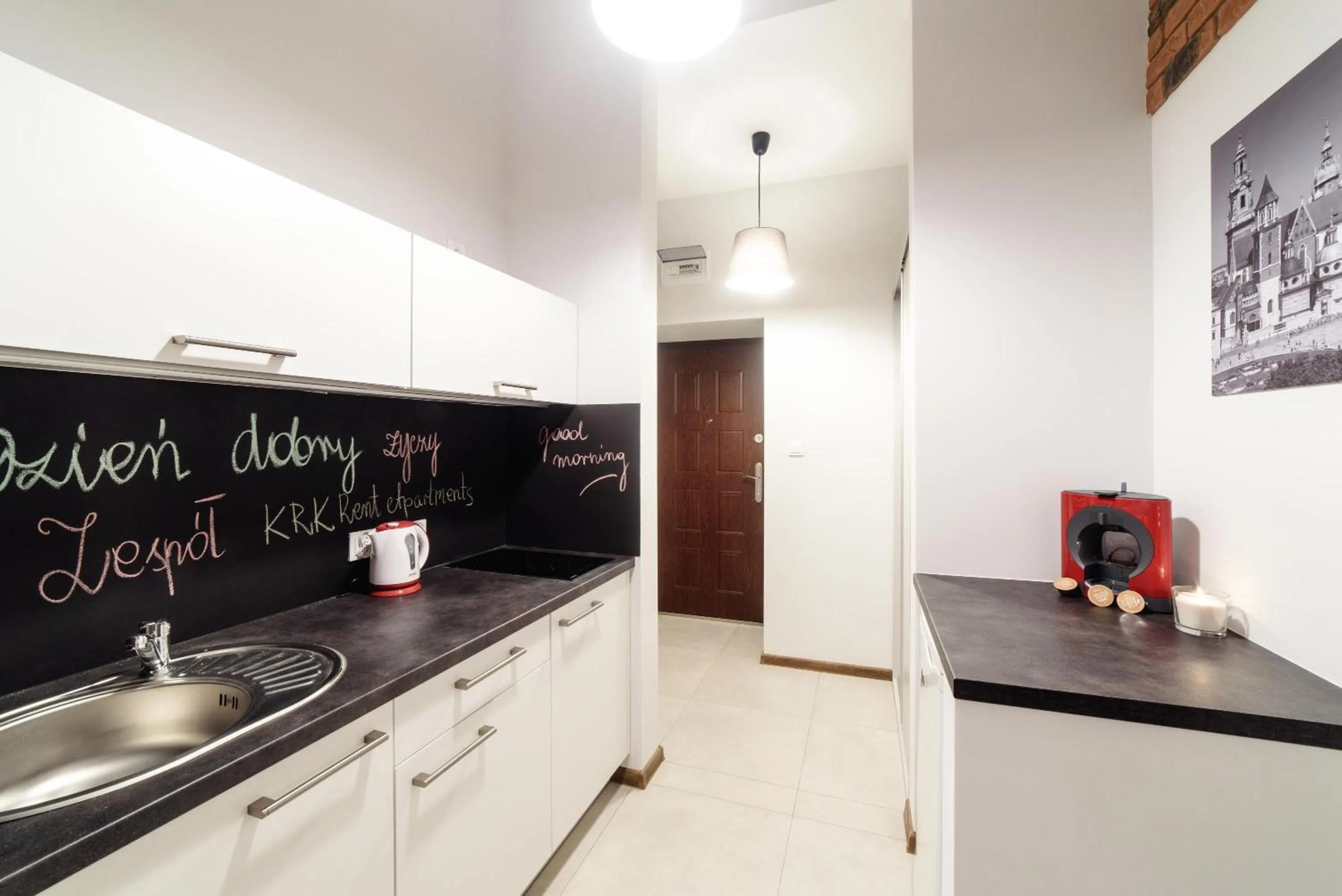 Kitchen or kitchenette in 2 Nights Apartments - great location, right next to Main Rail and Bus Station, 10 min to Main Square by foot