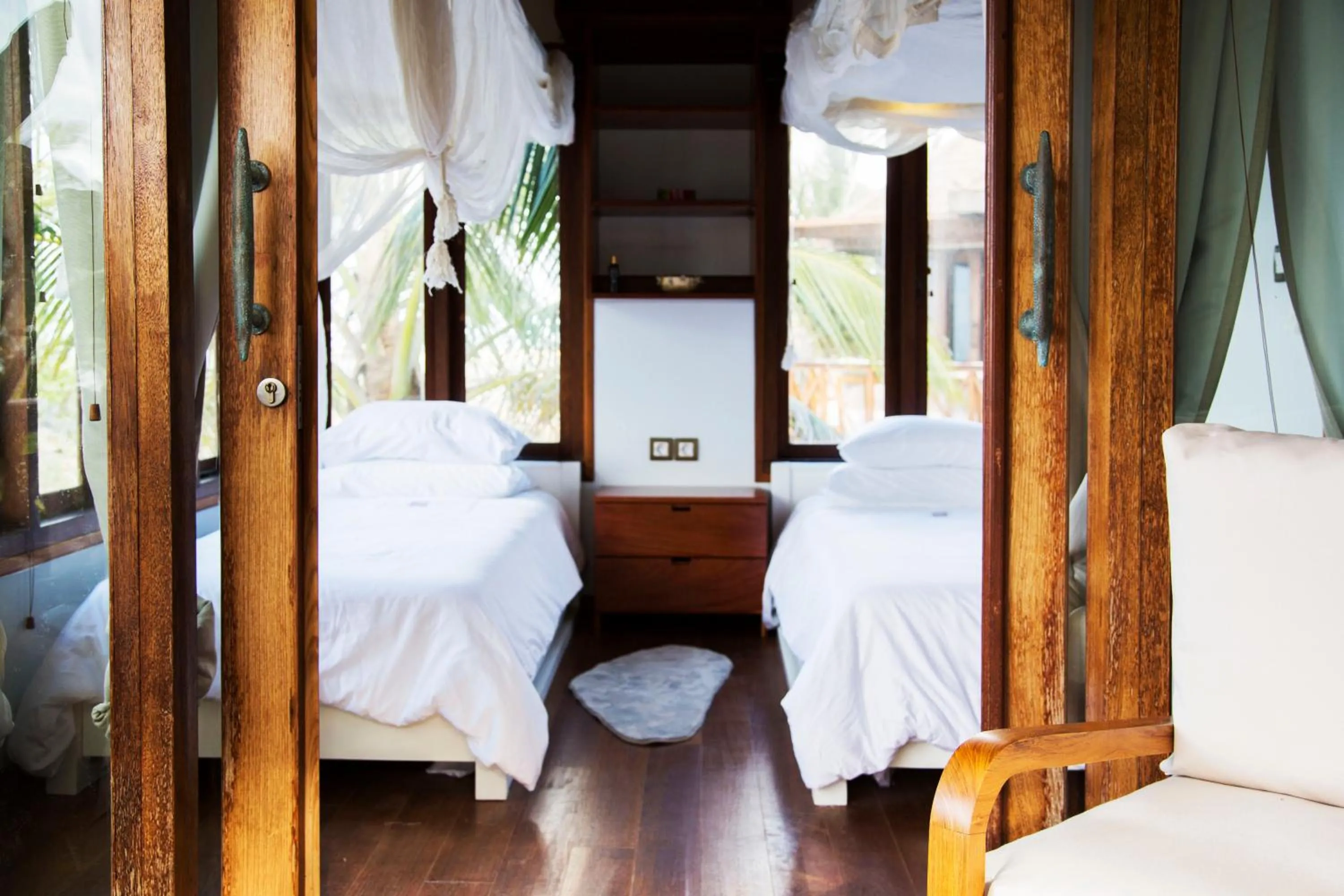 Bed in Sentidos Beach Retreat