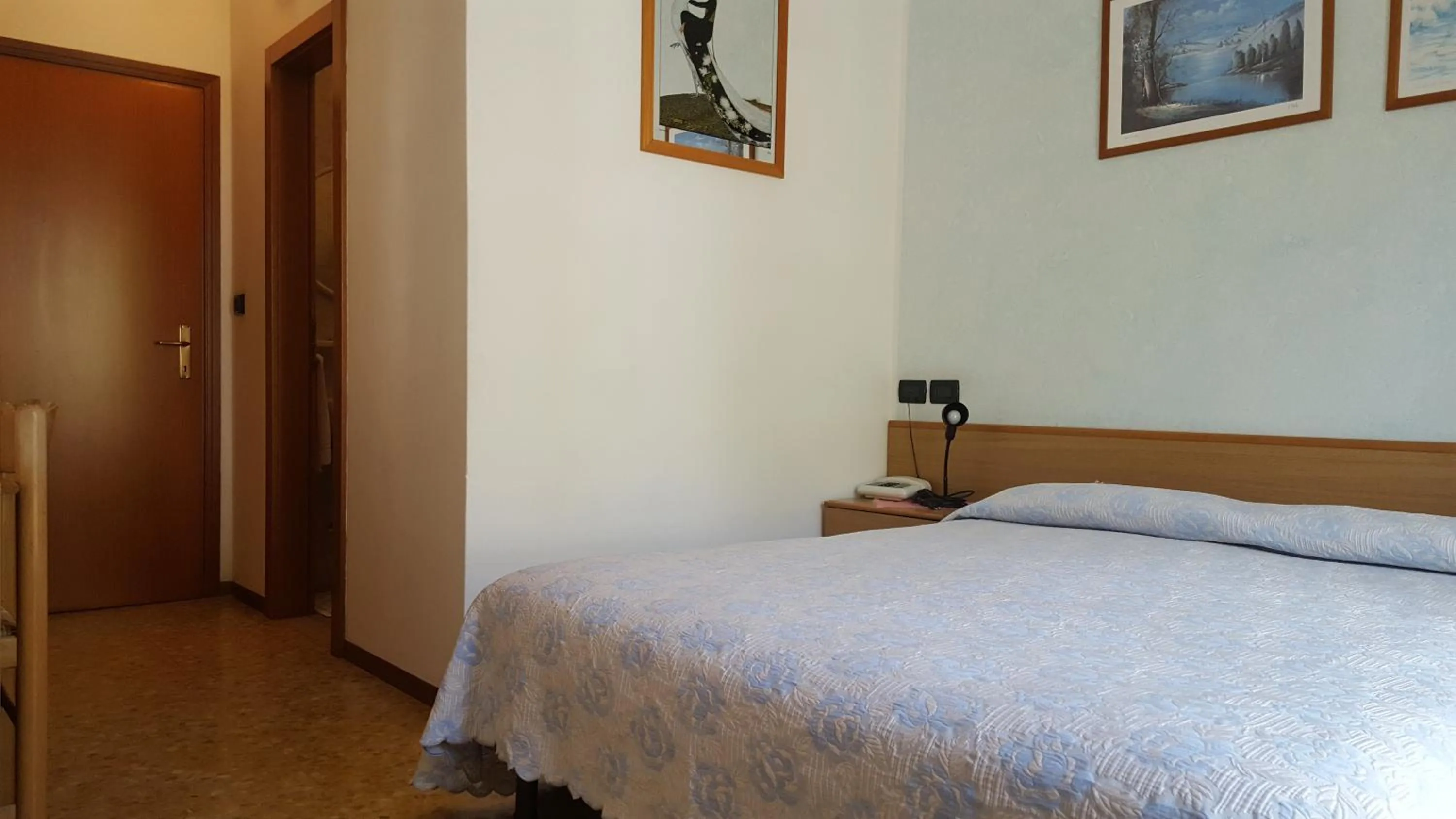 Bedroom in Hotel Firenze