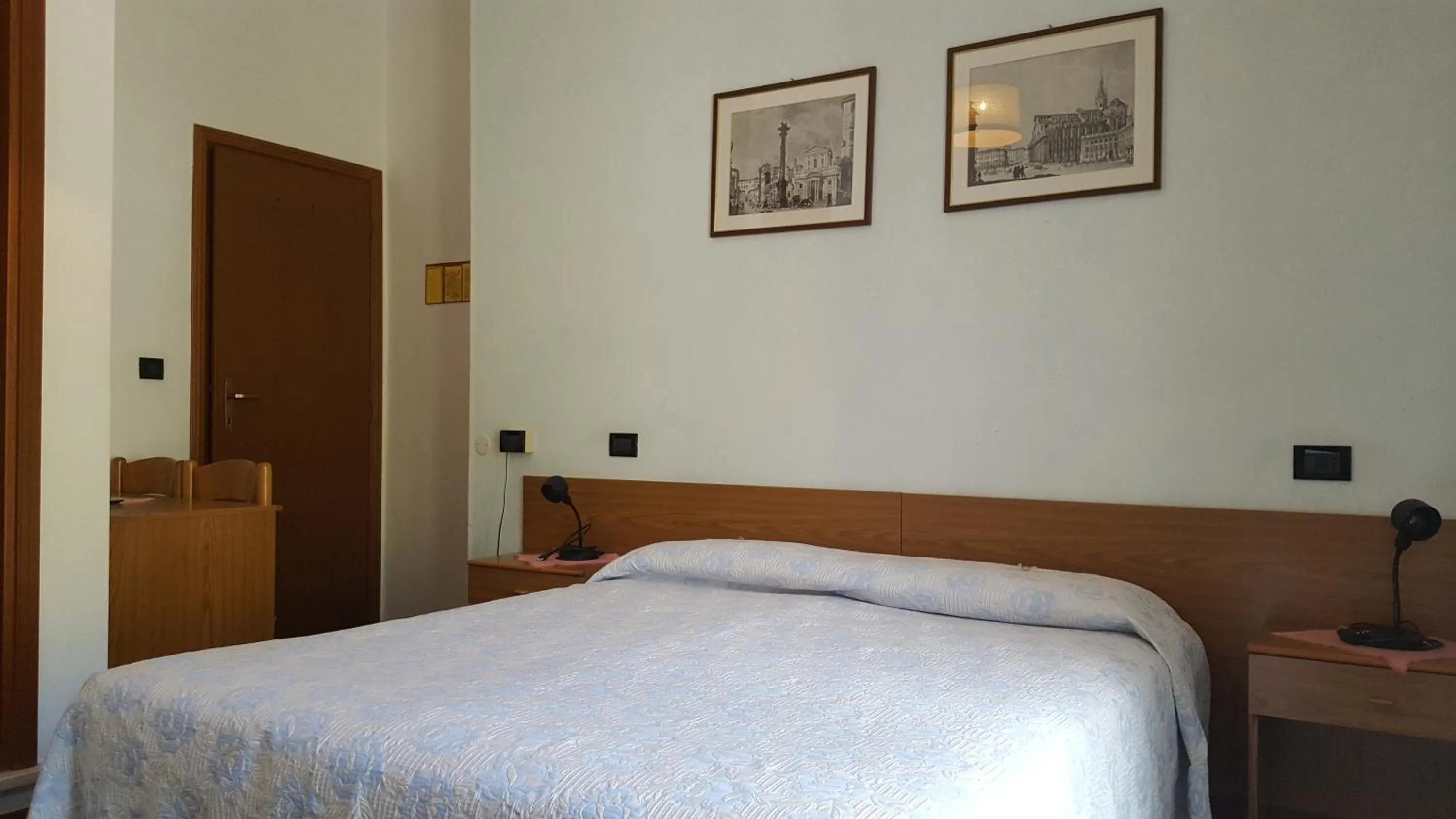 Bedroom in Hotel Firenze