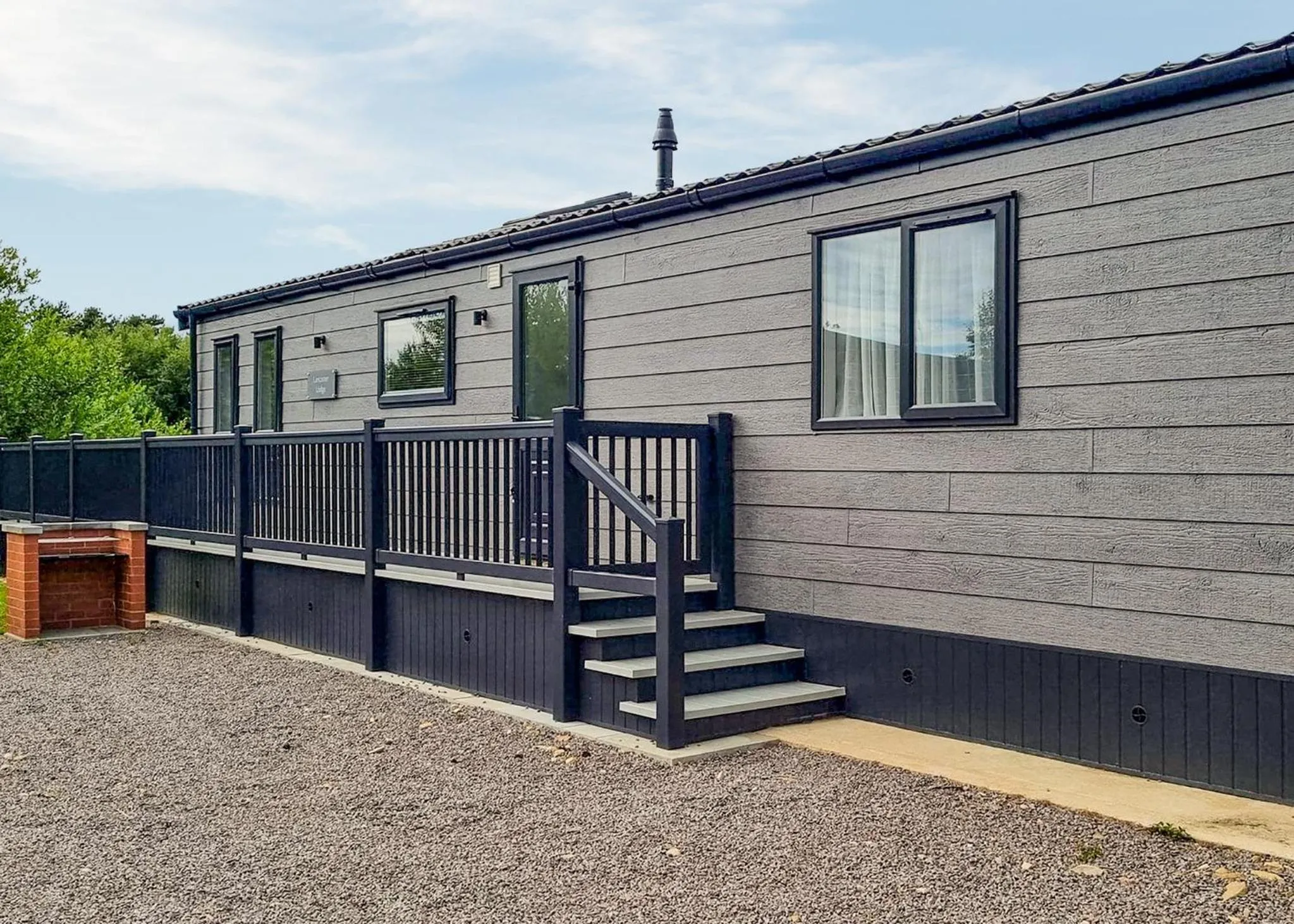 Property building in Woodhall Country Park Lodges