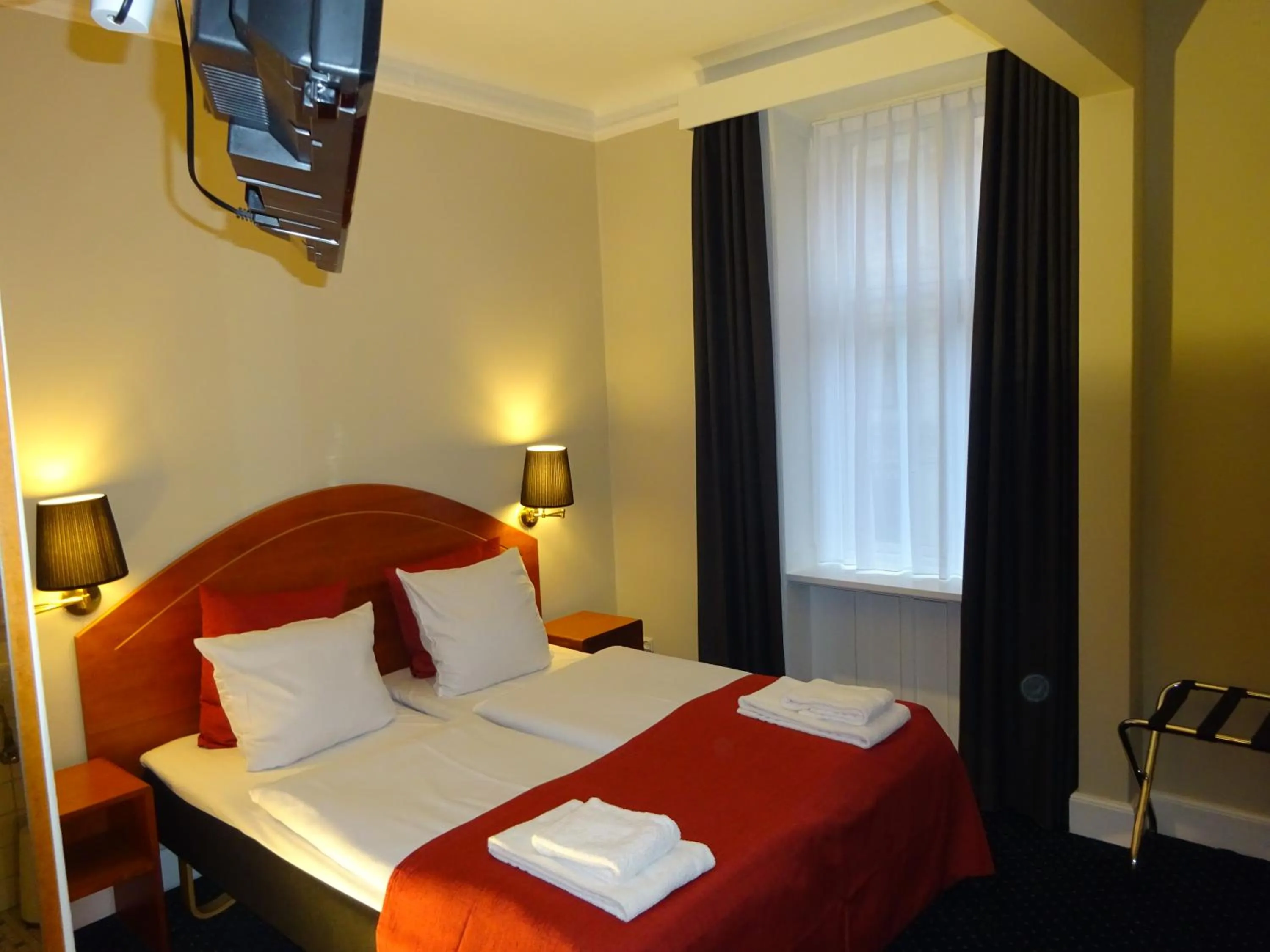 Bed in City Hotel Nebo