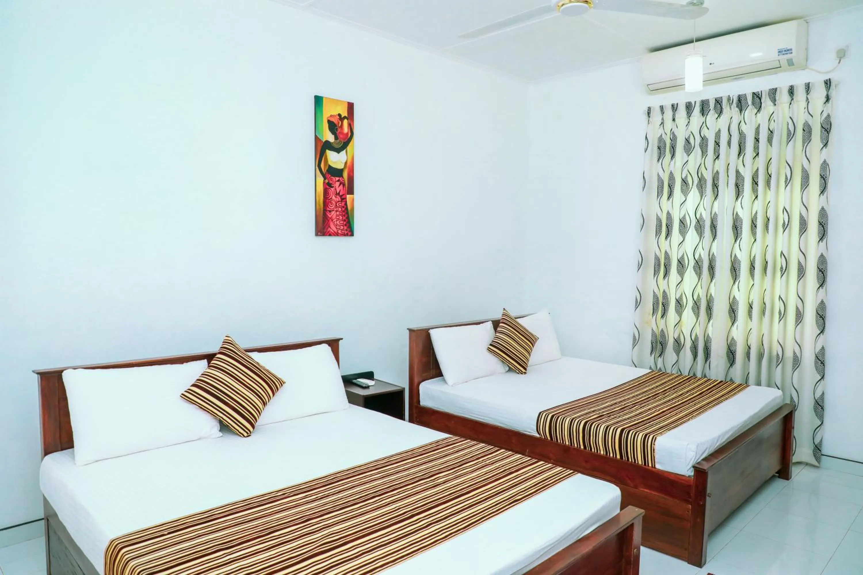 Bed in Bon Voyaage Tourist Inn