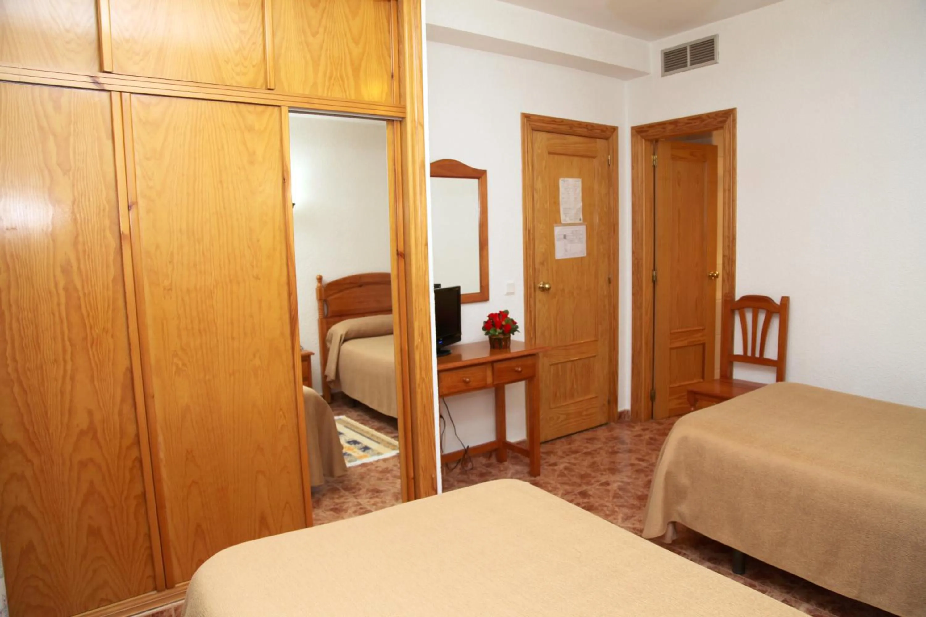 Bed in Hotel Los Arcos