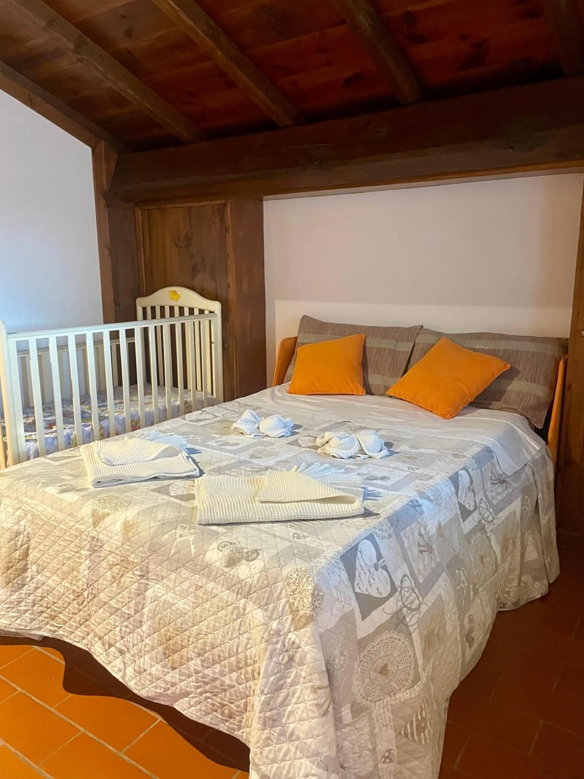 Living room, Bed in Casa Sperandini