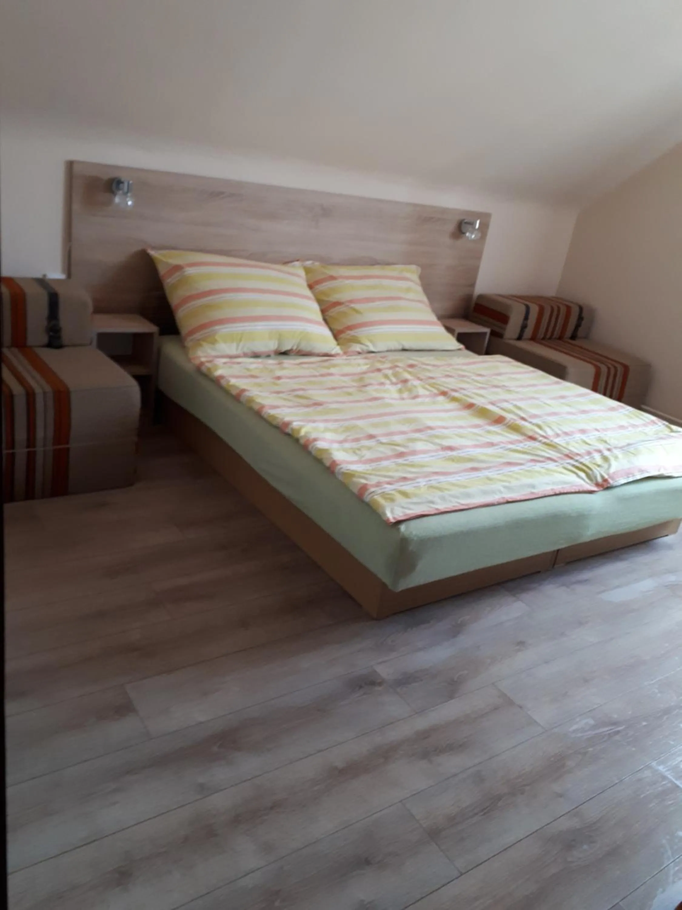 Bed in Anna Báthory Apartmanház