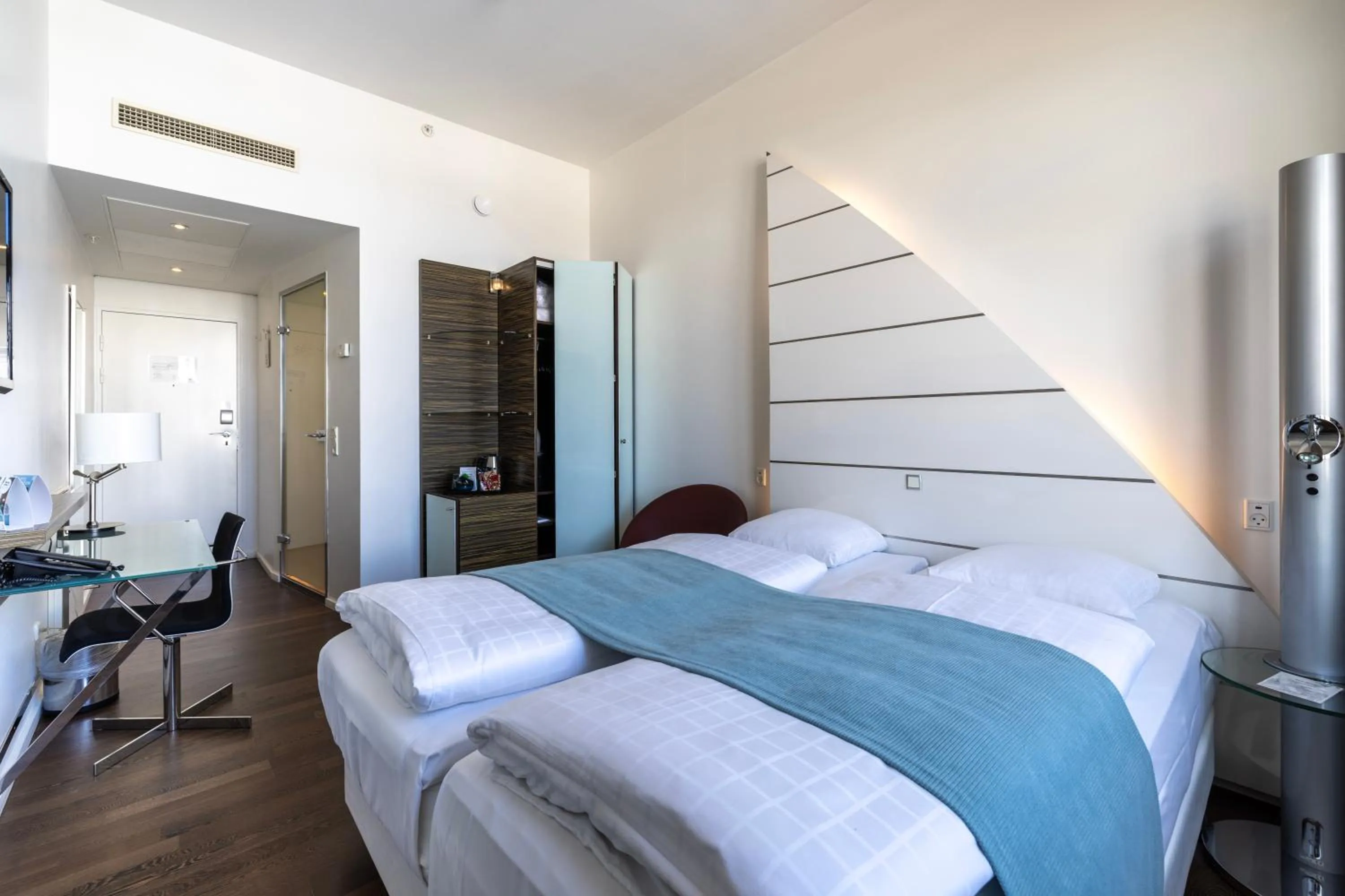 Bed in Copenhagen Island Hotel