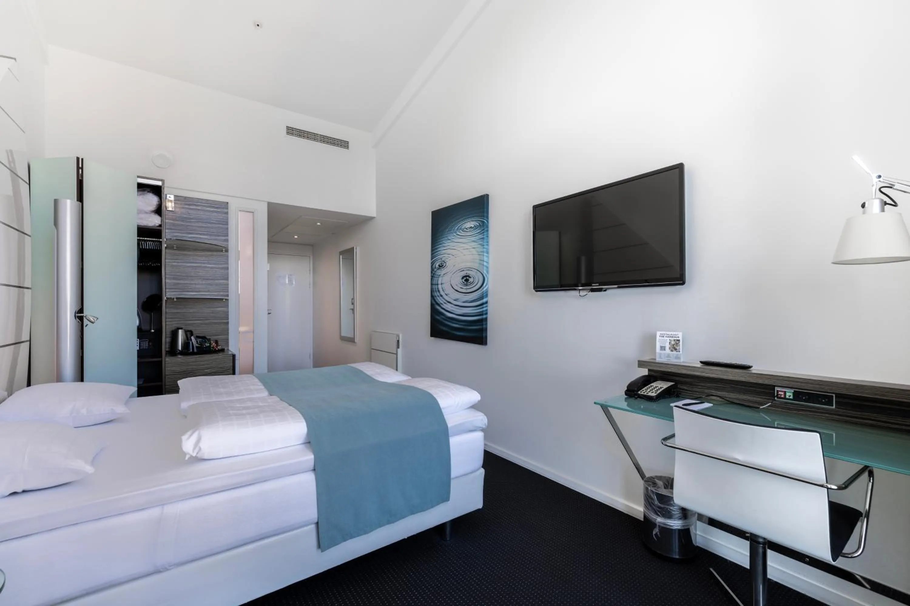 Bed in Copenhagen Island Hotel