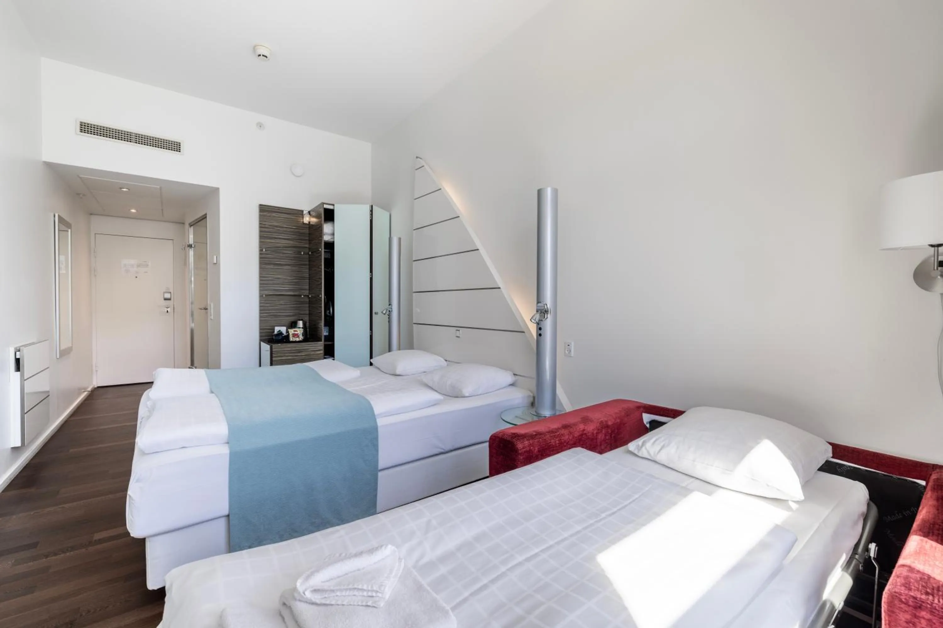 Bed in Copenhagen Island Hotel