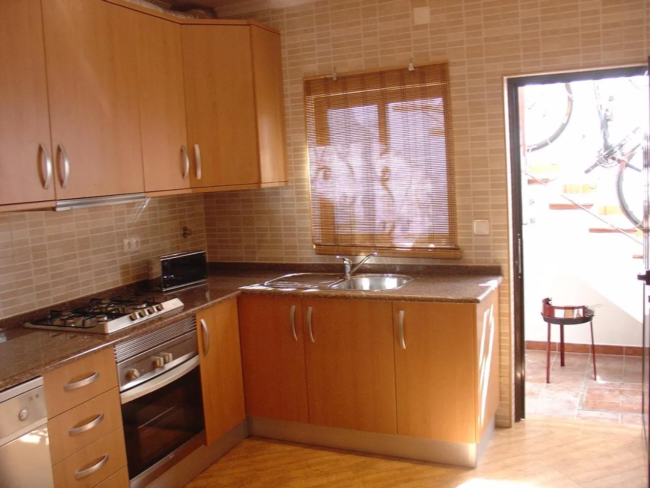Kitchen or kitchenette in Apartamento Sol e Mar