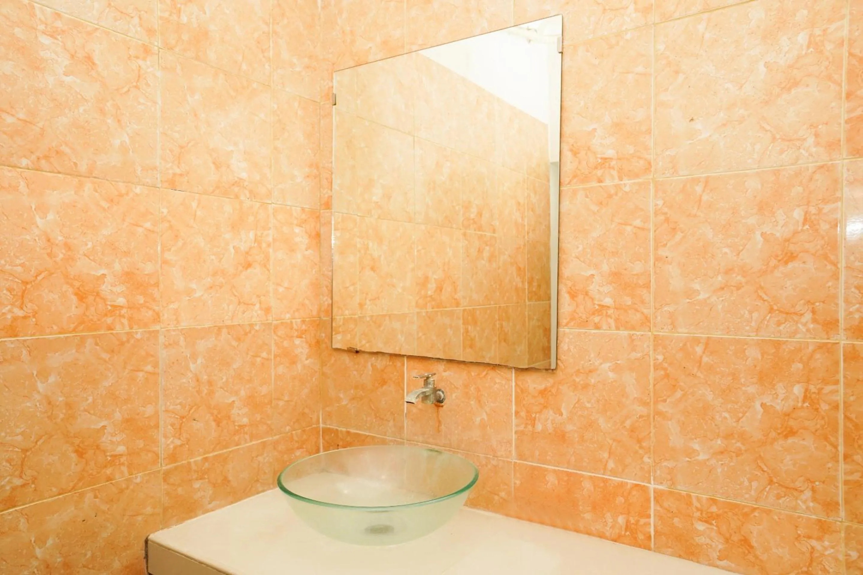 Bedroom in Capital O 1430 Hotel Ratna Syariah