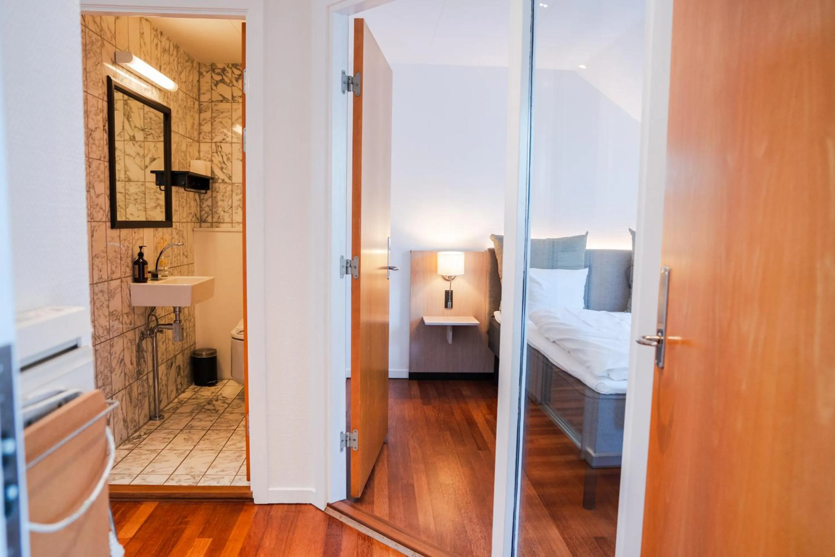 Bathroom, Bed in Hotel Scheelsminde