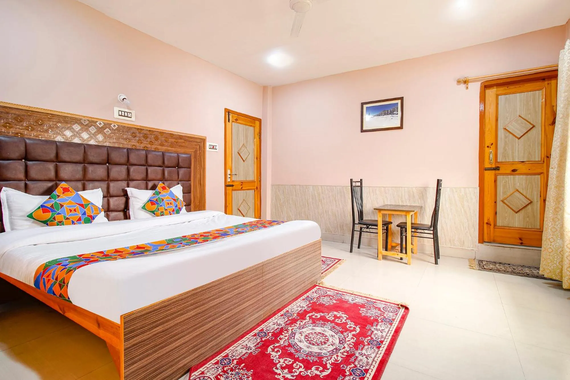 Bed in FabHotel Grand Comforts