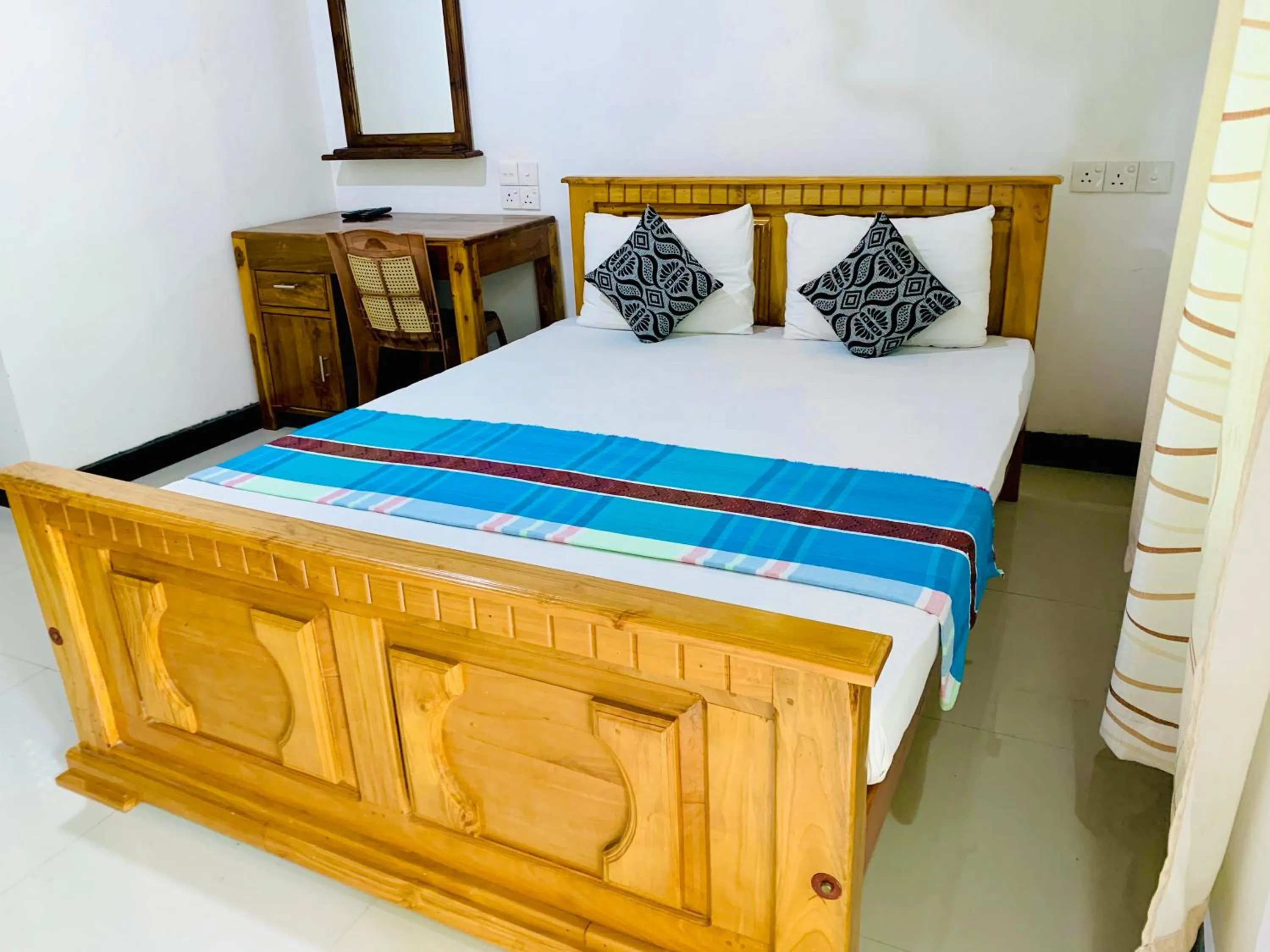 Bed in Rich Resort & Restaurant