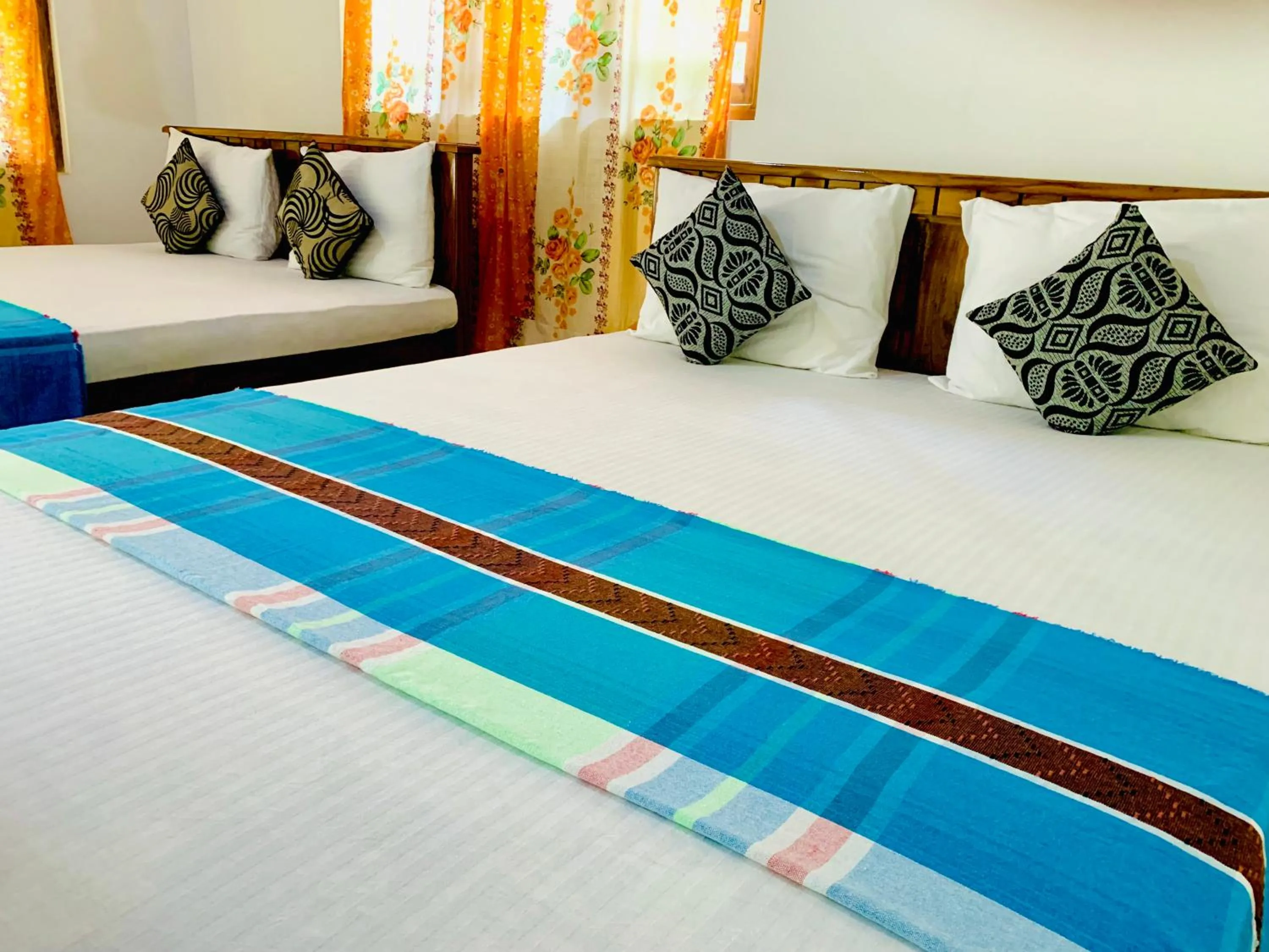 Bed in Rich Resort & Restaurant